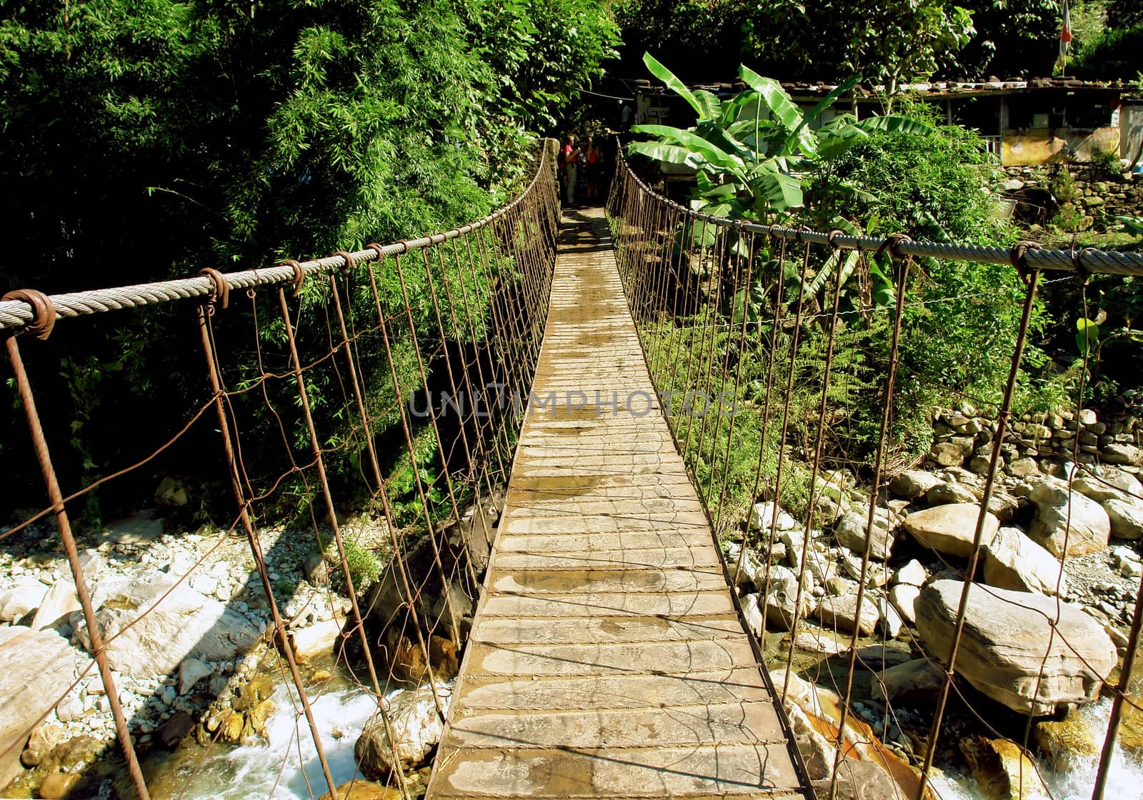 River suspended rope bridge, Himalayan Annapurna region, Nepal