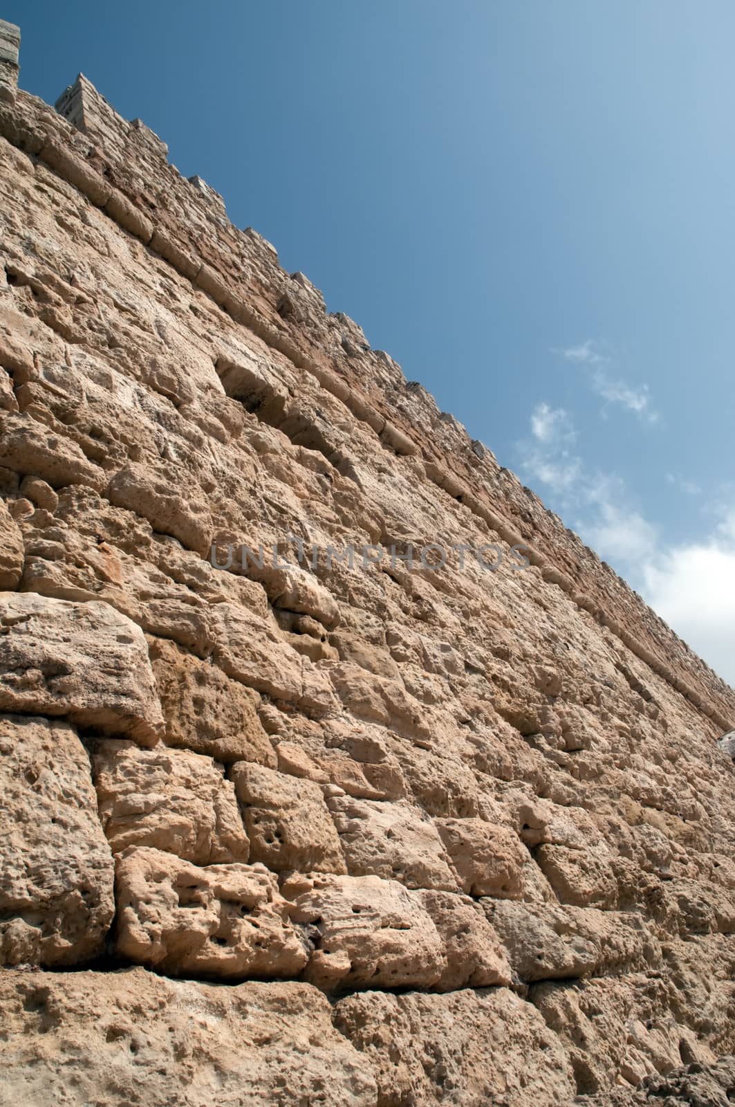 The wall of an ancient fortress .