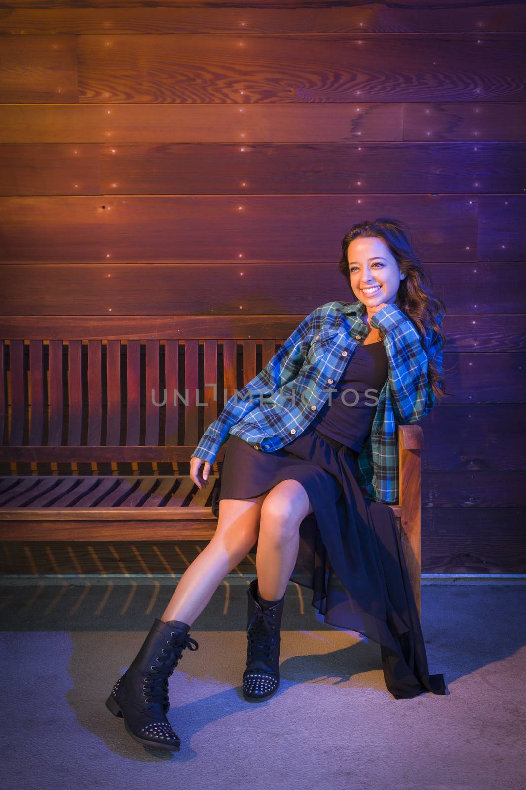 Mixed Race Young Adult Woman Portrait Sitting on Wood Bench by Feverpitched