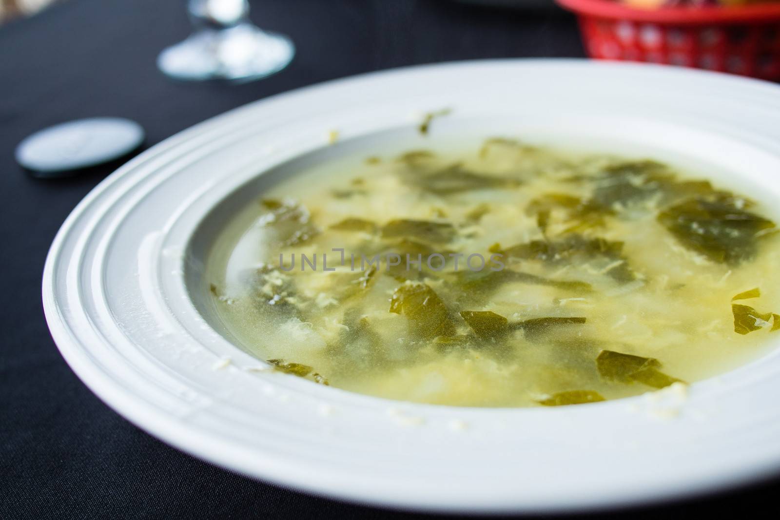 Traditional italian soup with eggs in a restaurant