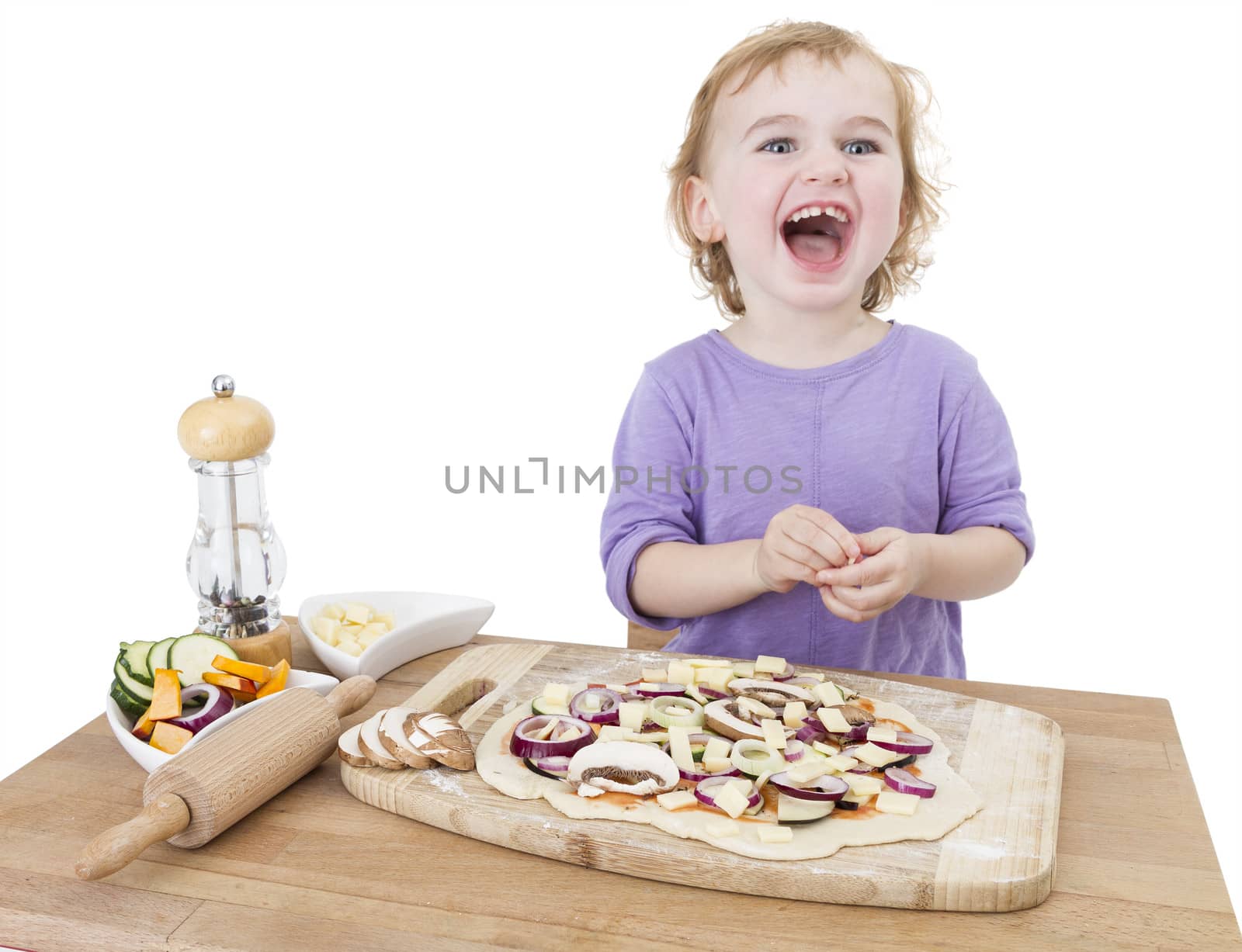 laughing child with home made pizza by gewoldi