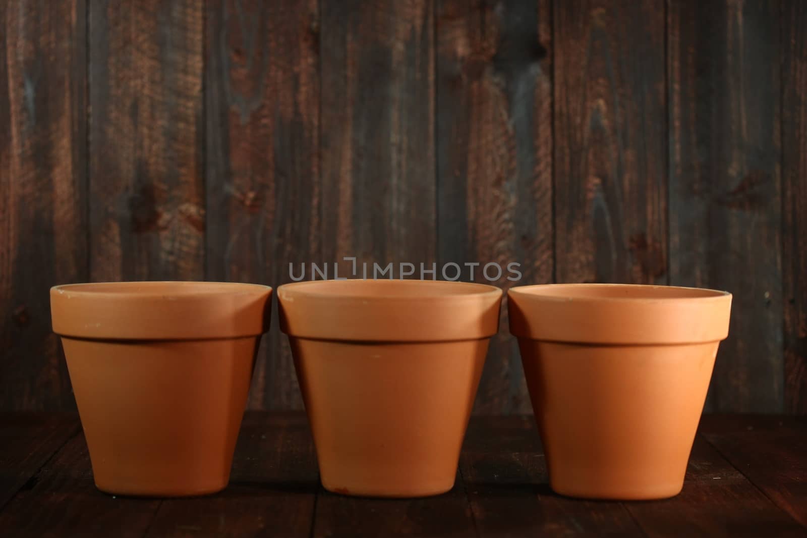 Three Empty Clay Flower Pots Background