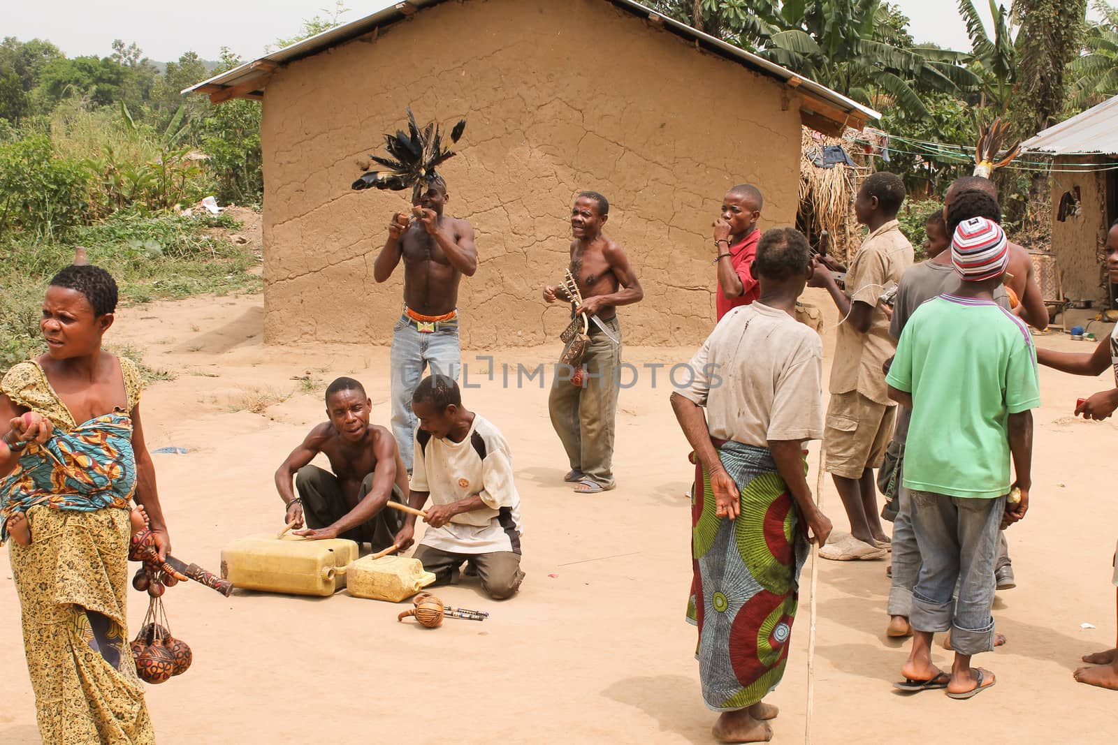 Uganda - 6 March: Pygmies are dancing in the village and play musical instruments 6 March 2012 in Uganda