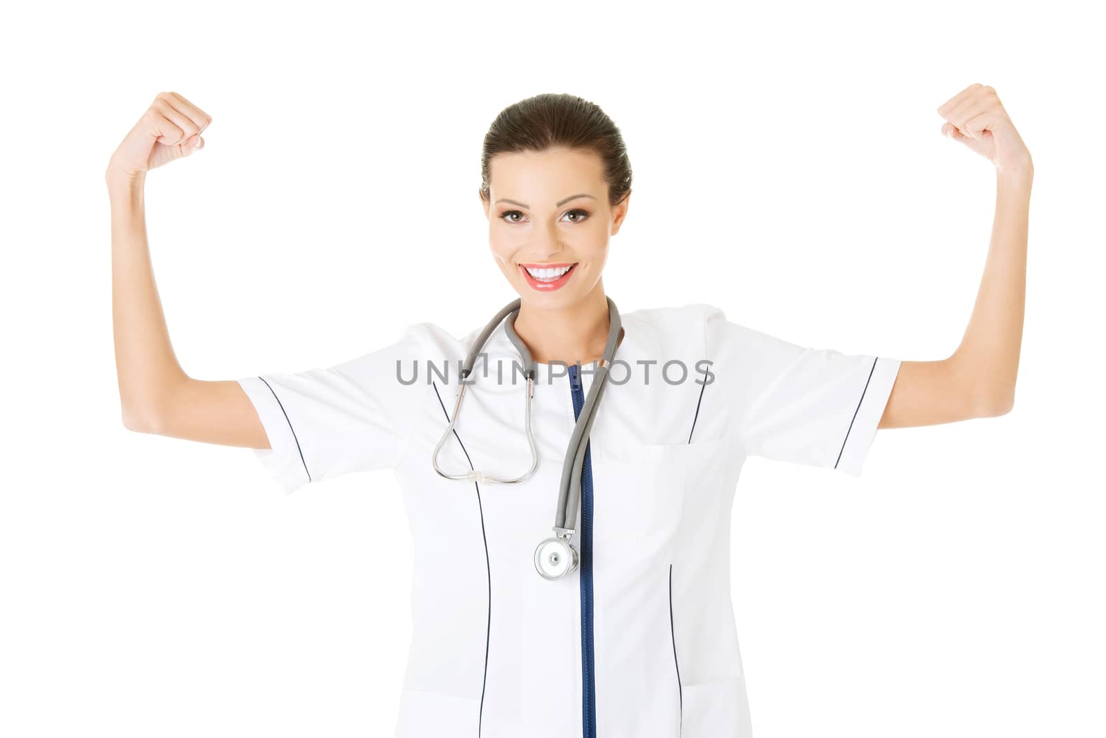 Attractive young nurse with raised hands. Isolated on white.