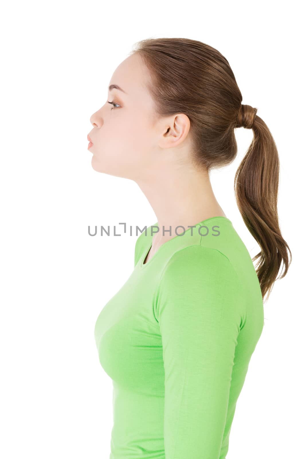 Attractive woman's profile. Closeup. Isolated on white.