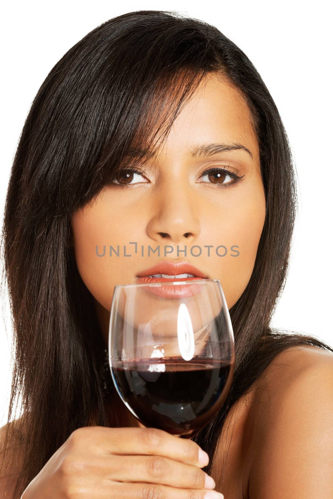 Attractive naked woman with glass of wine. Closeup. Isolated on white.