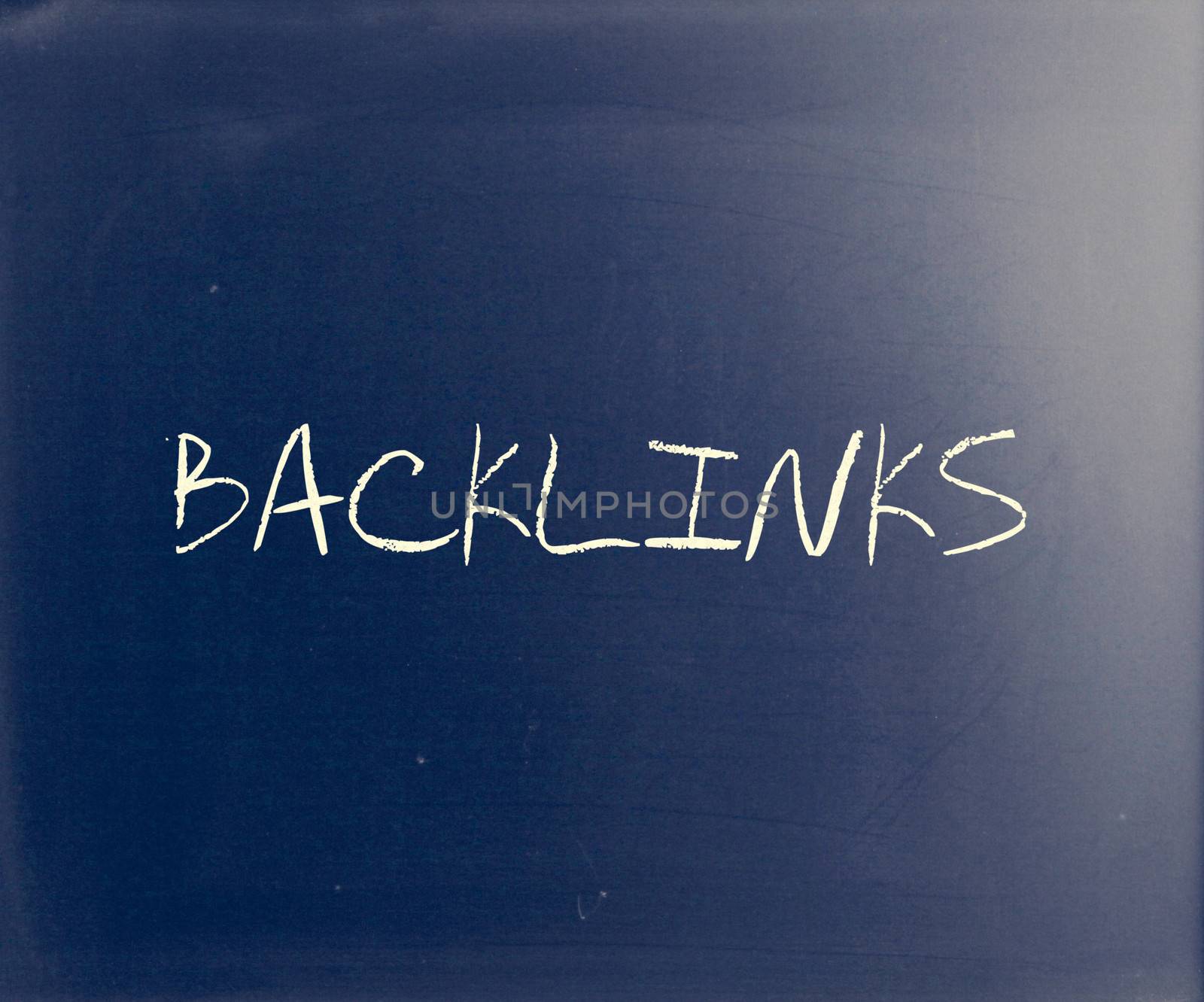 "Backlinks" handwritten with white chalk on a blackboard by nenov