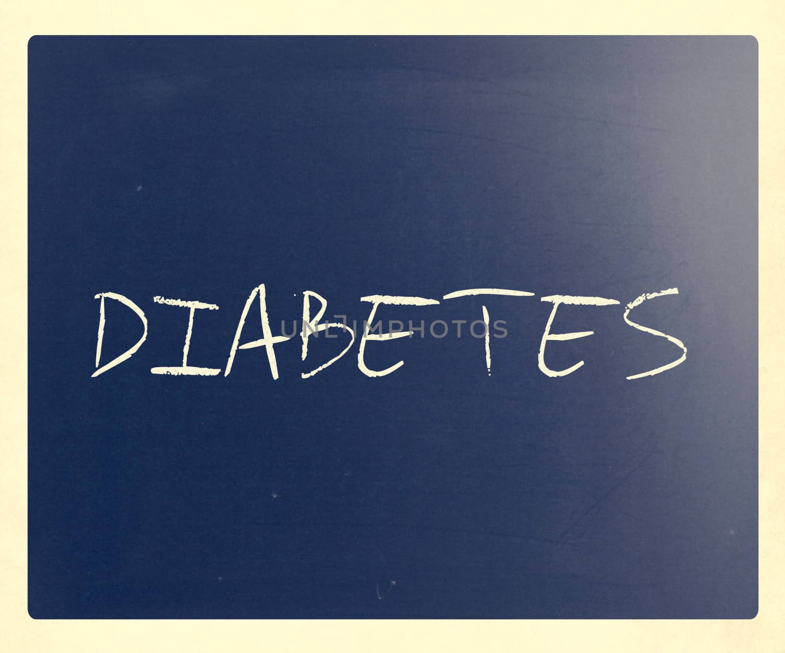 The word "Diabetes" handwritten with white chalk on a blackboard.