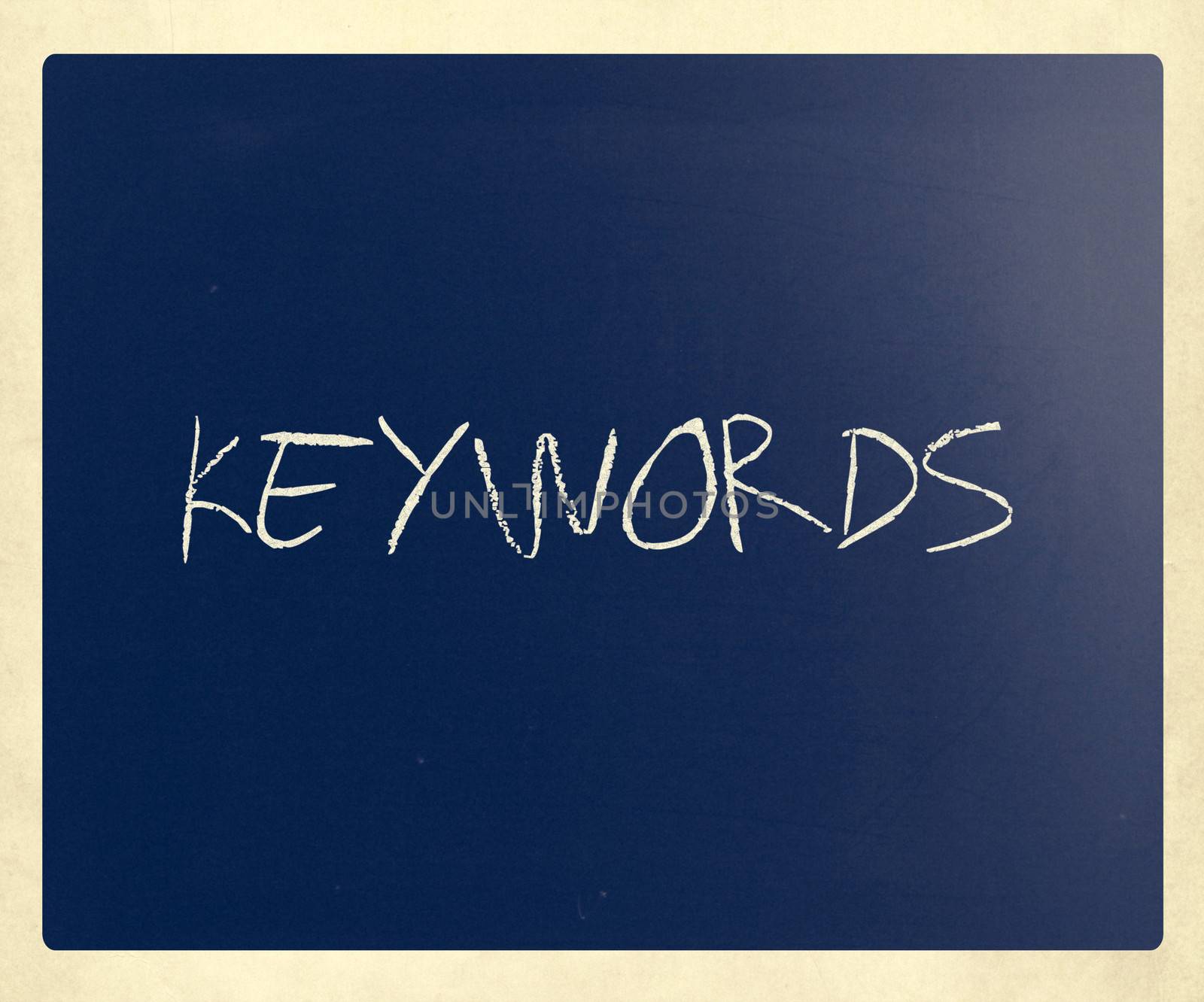 The word "Keywords" handwritten with white chalk on a blackboard.