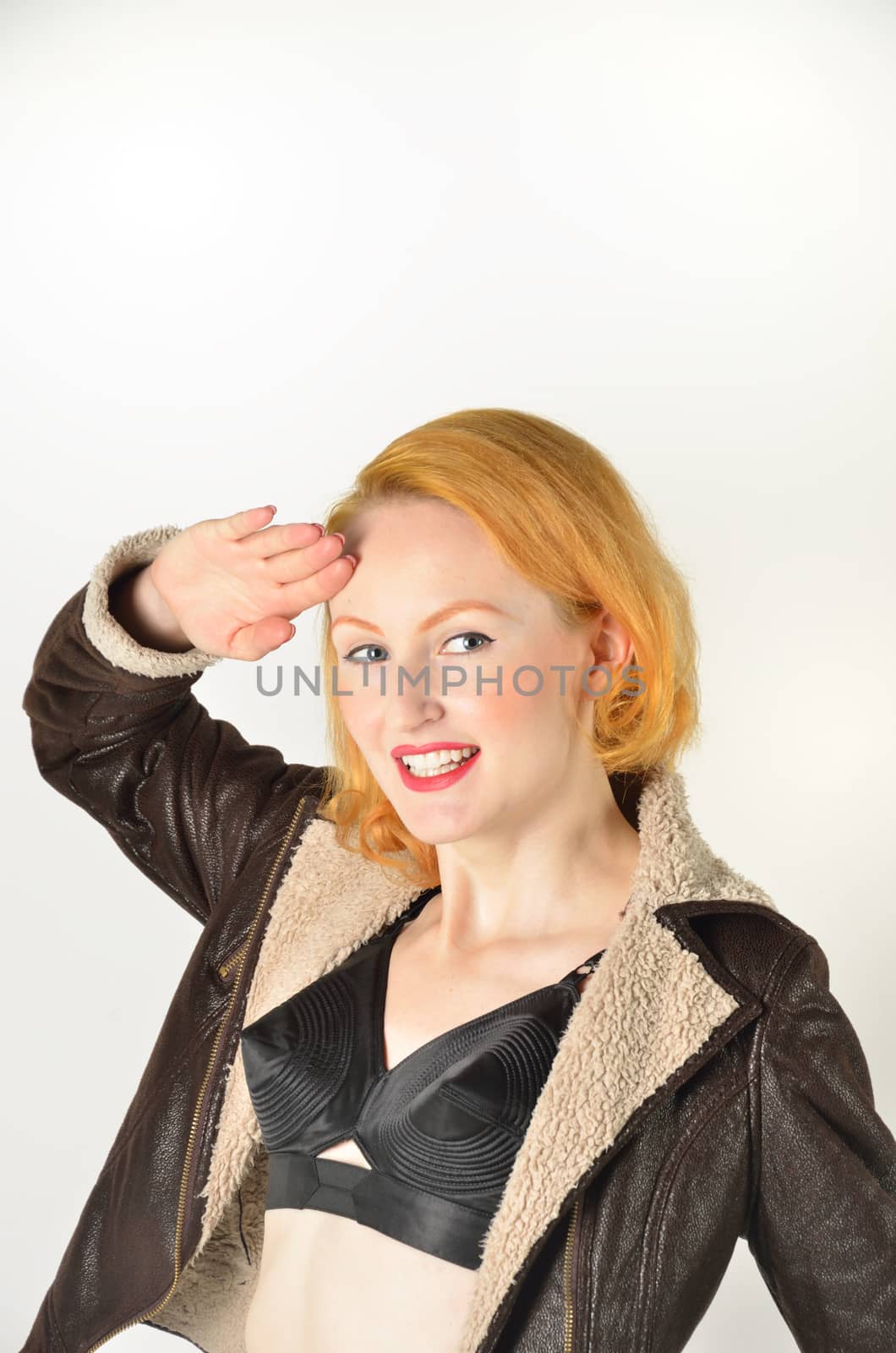 Smiling Red head saluting