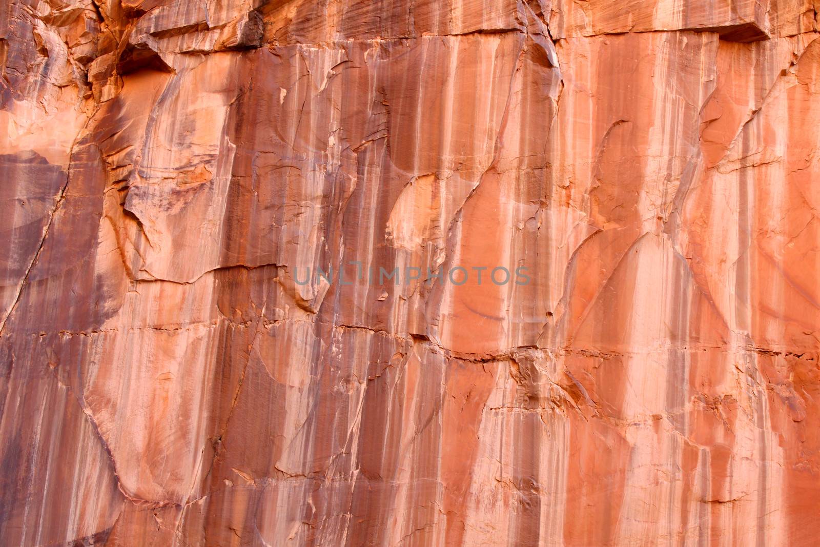 Streaks of color along the Capitol Gorge rock wall of Capitol Reef National Park.