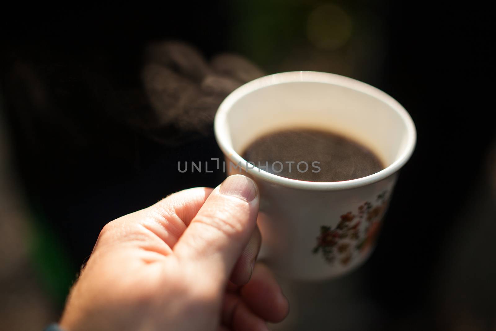 Hot coffee outside by a sunny morning