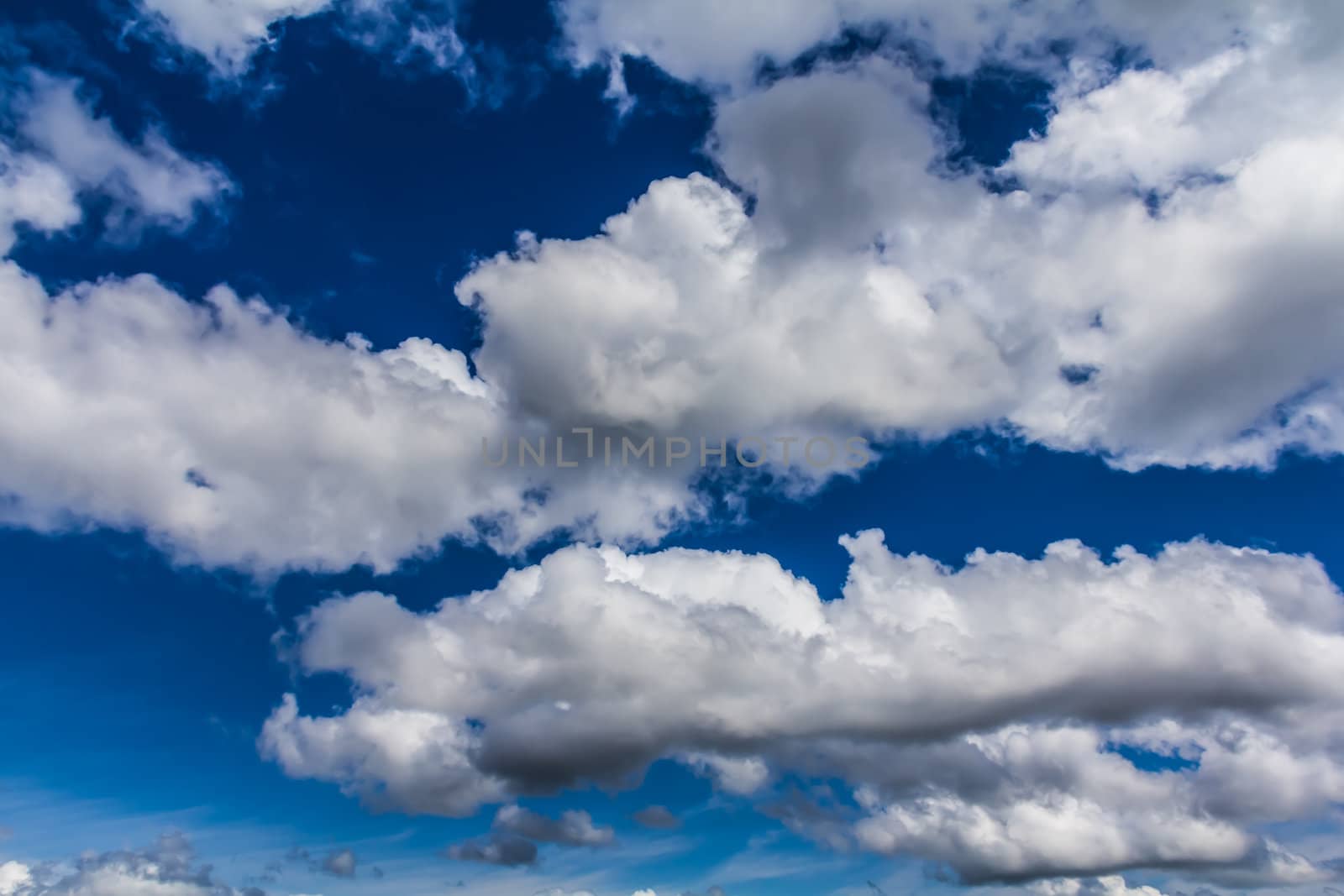 Cumulus clouds by petkolophoto