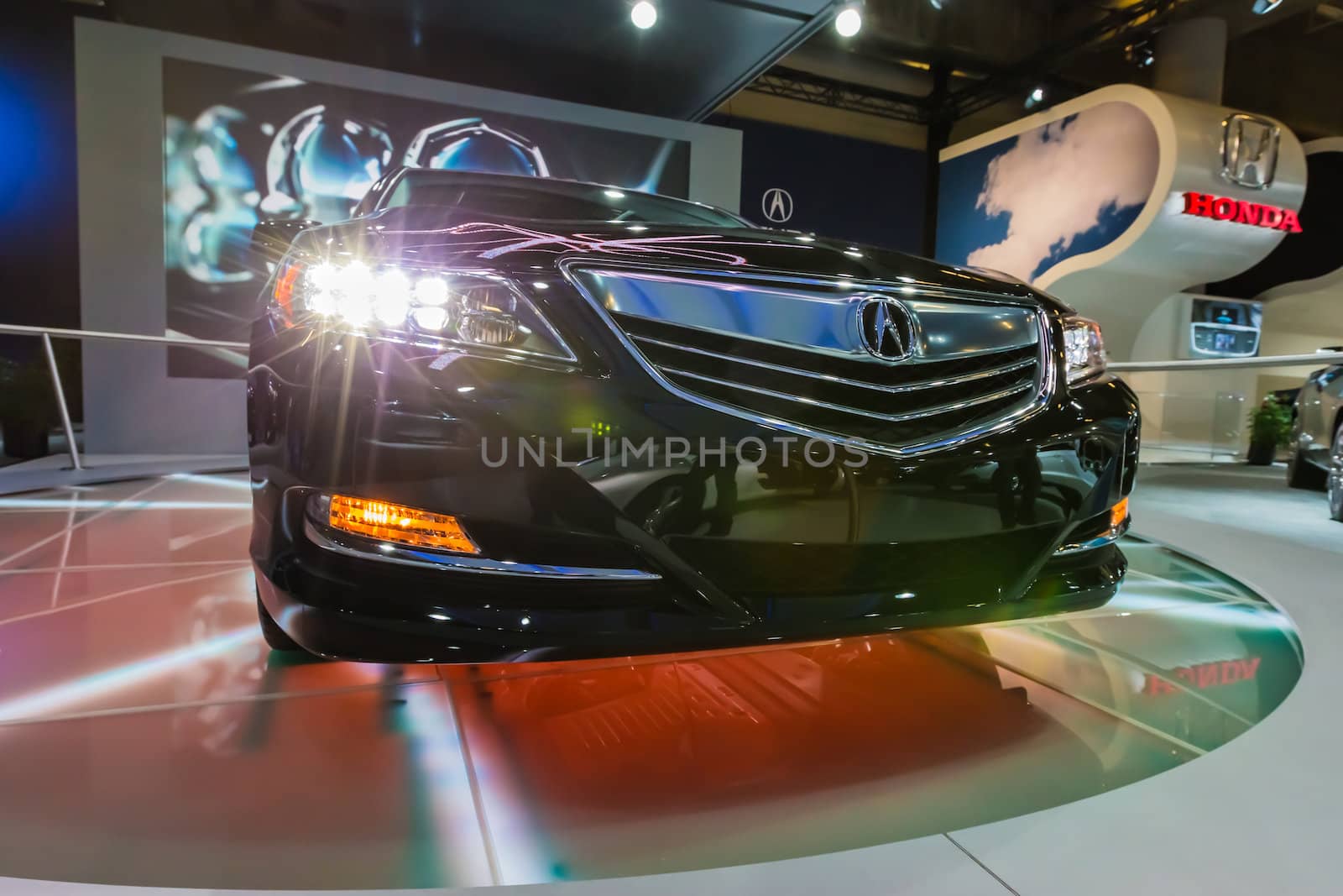 A black 2013 Acura RLX in Montreal auto show, Quebec, Canada