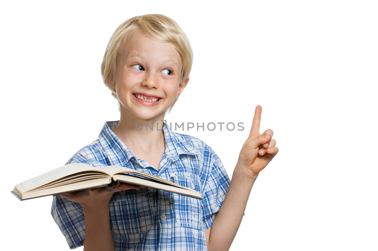 Young boy holding book and pointing by Jaykayl