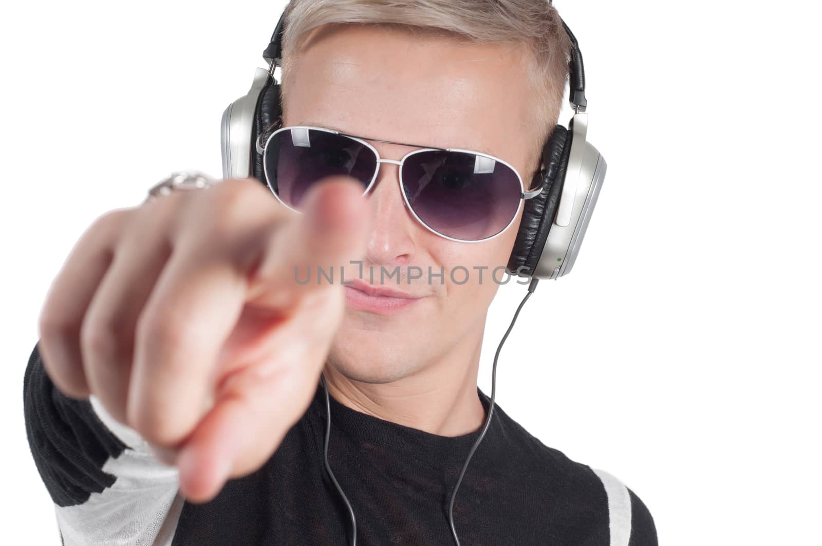 Man with headphones pointing her finger by anytka