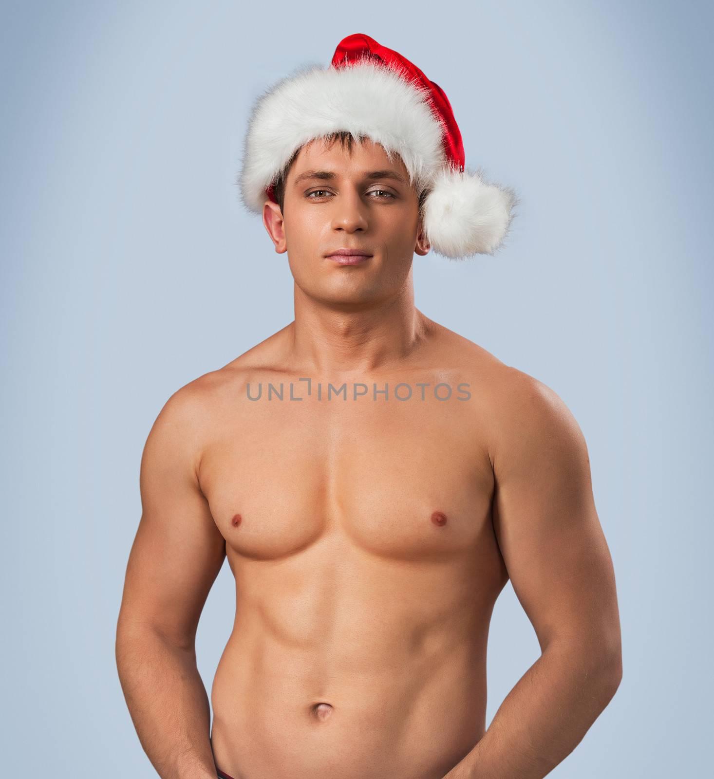 portrait of naked male in santa cap by mihalec