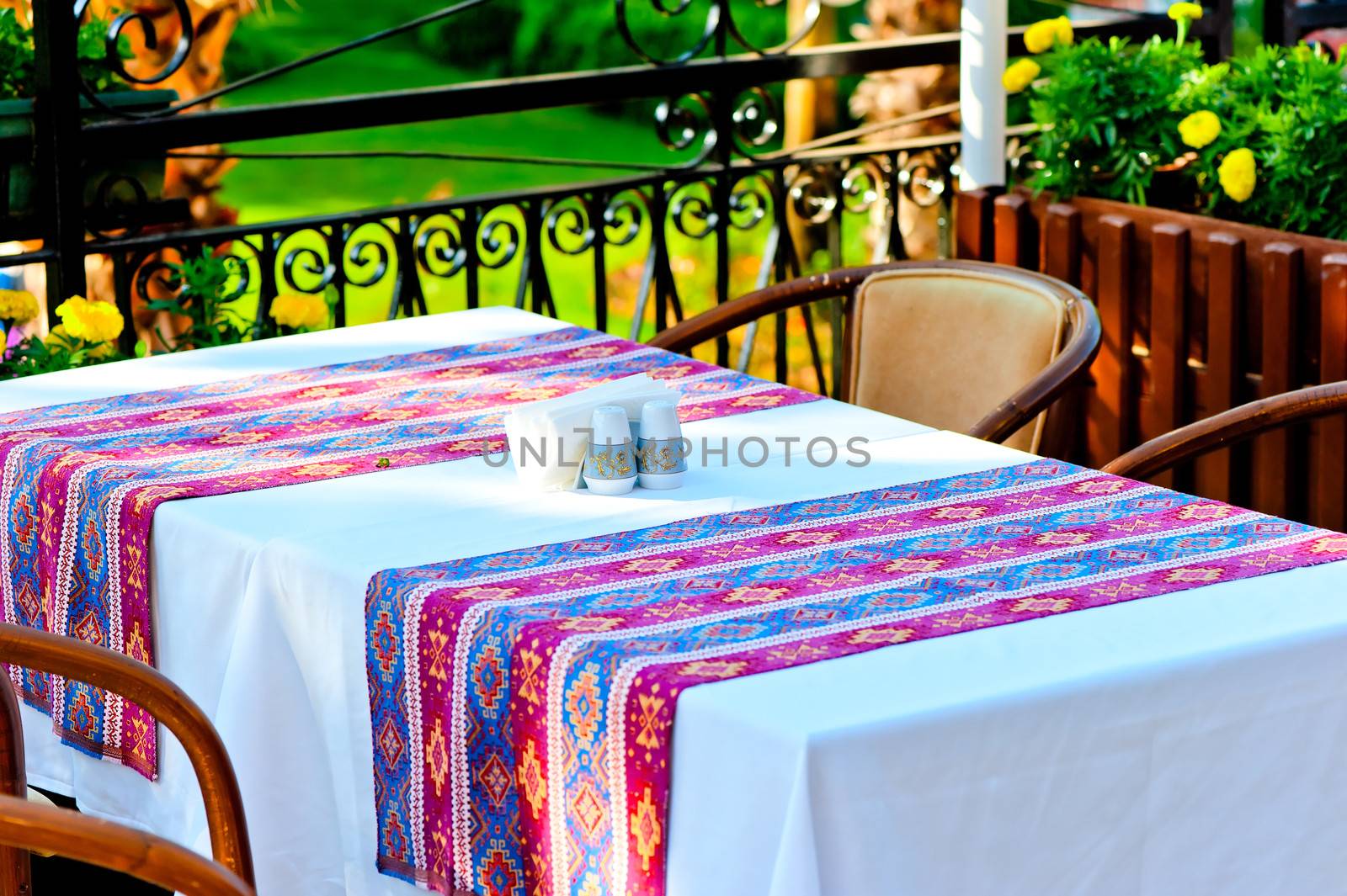 table covered with a tablecloth in a restaurant with Turkish ornament