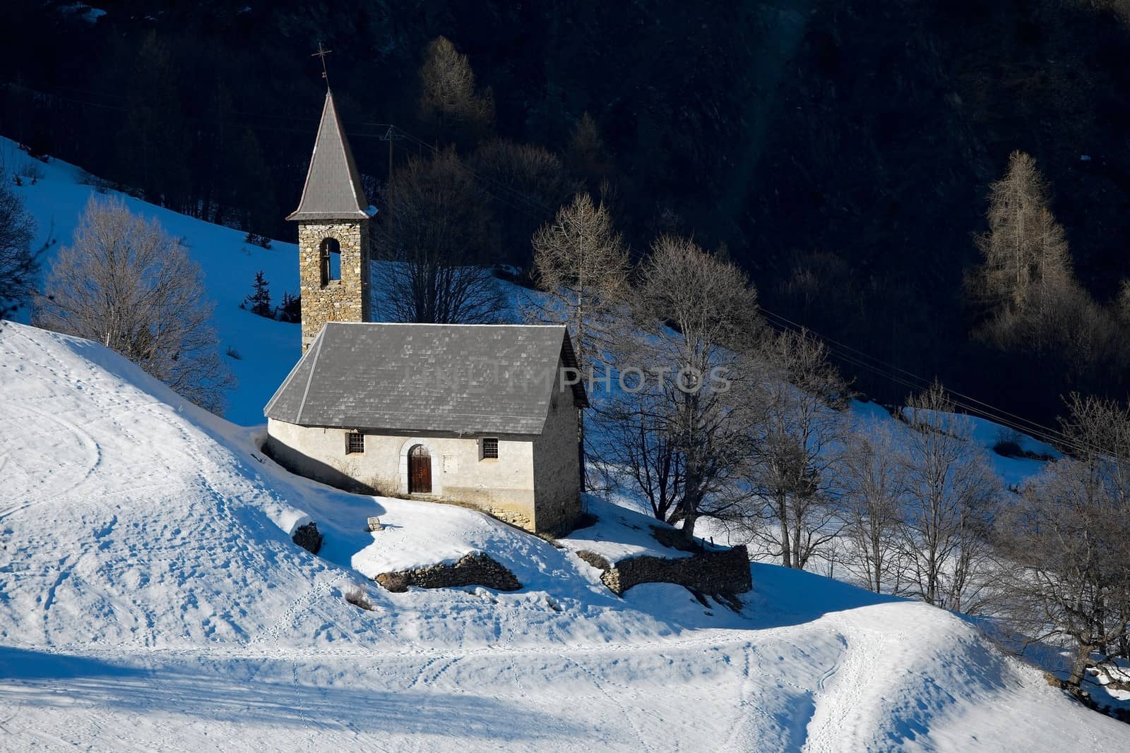 Small church in a snowy landscape