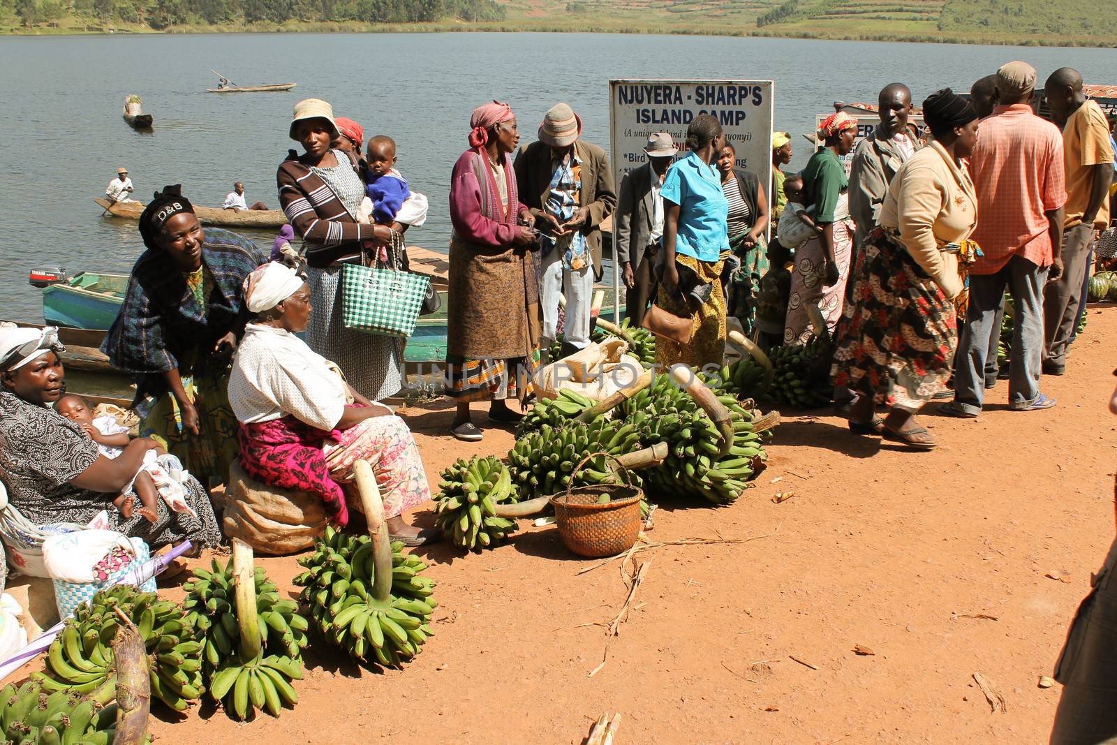 Uganda, lake Bunyonyi - 9 March: African women selling bananas in the market on lake Bunyonyi 9 March 2012 in Uganda.