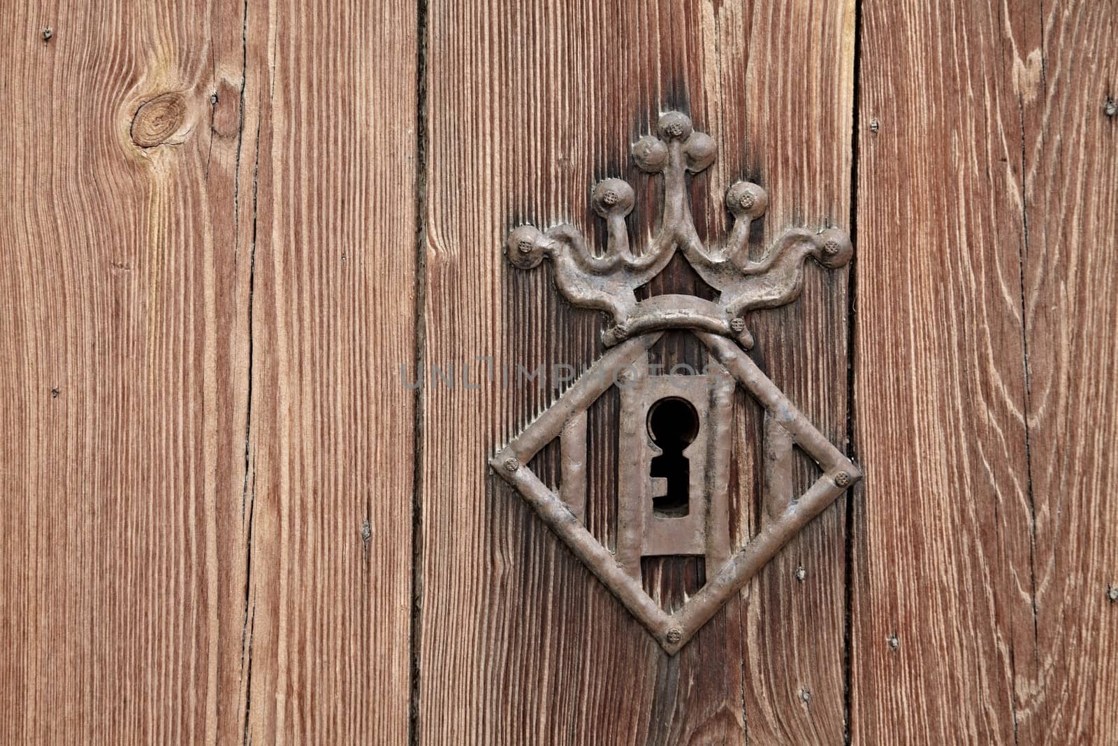 Old wooden gate lock closeup