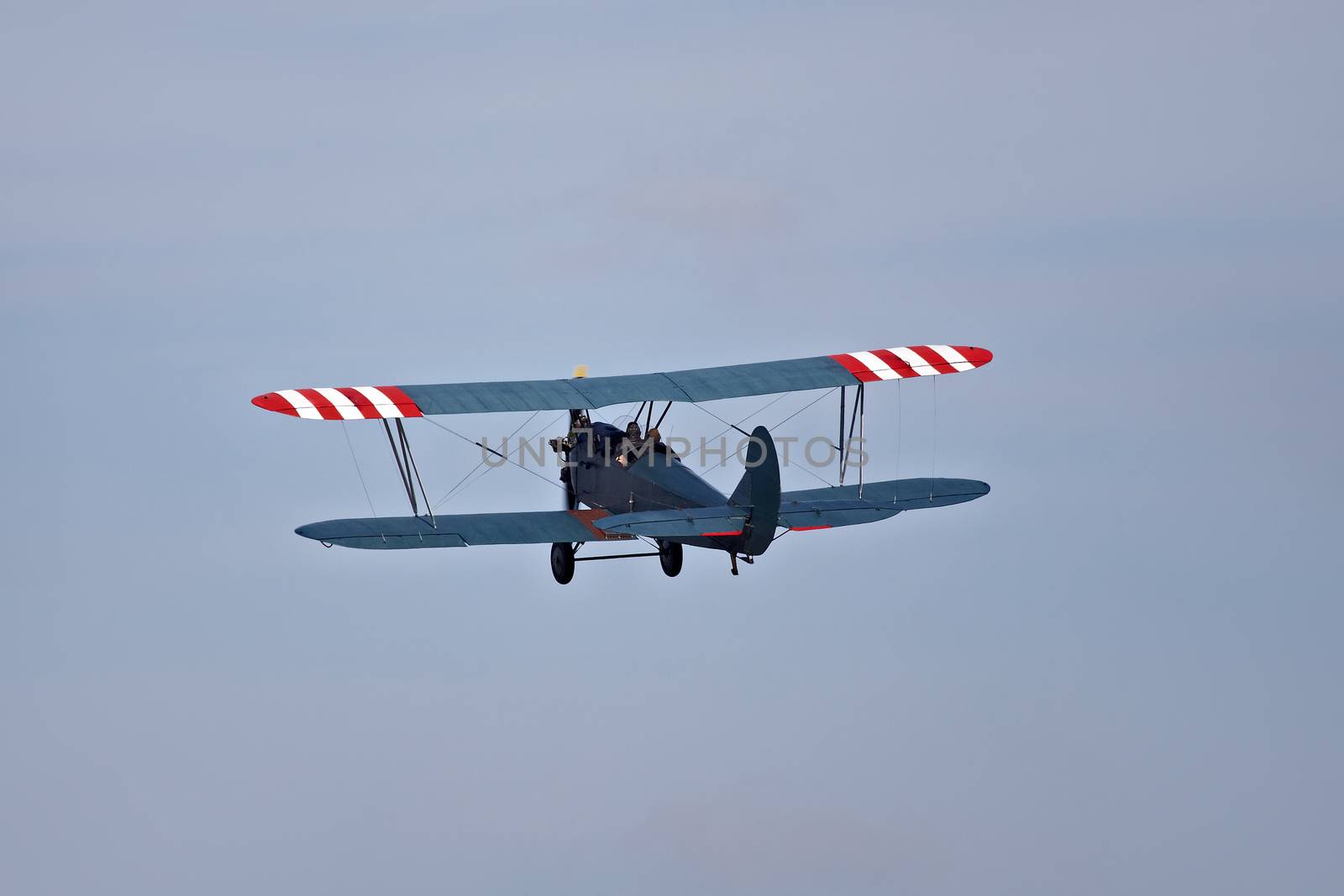 Old airplane against blue sky