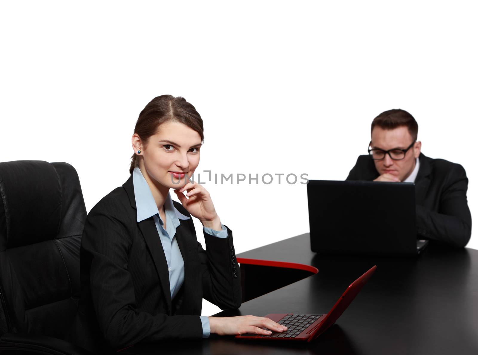 Young Business Couple on Laptops by RazvanPhotography