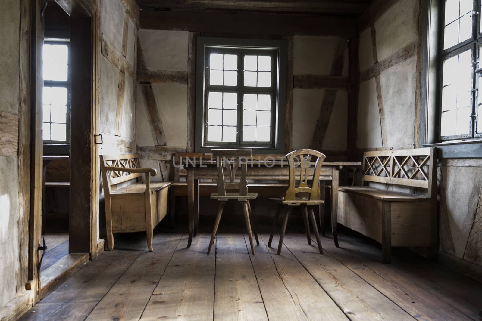 rustic chamber with bench, table and chair. by gewoldi