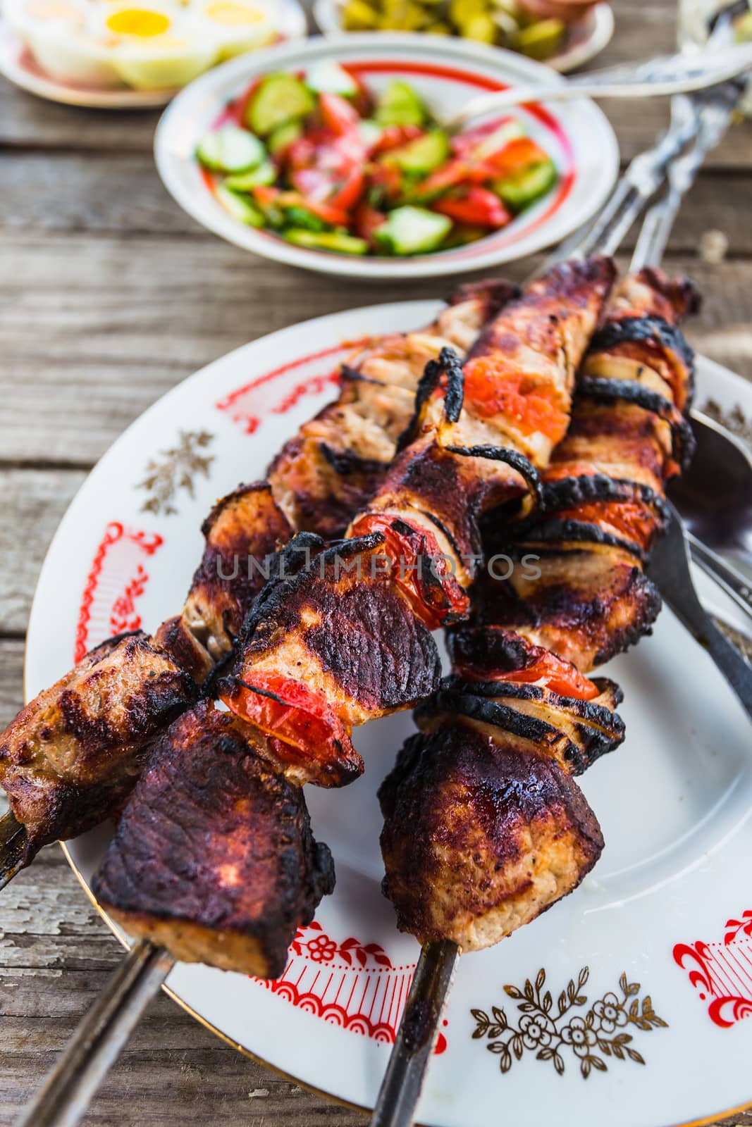Shish kebabs on skewers on a plate