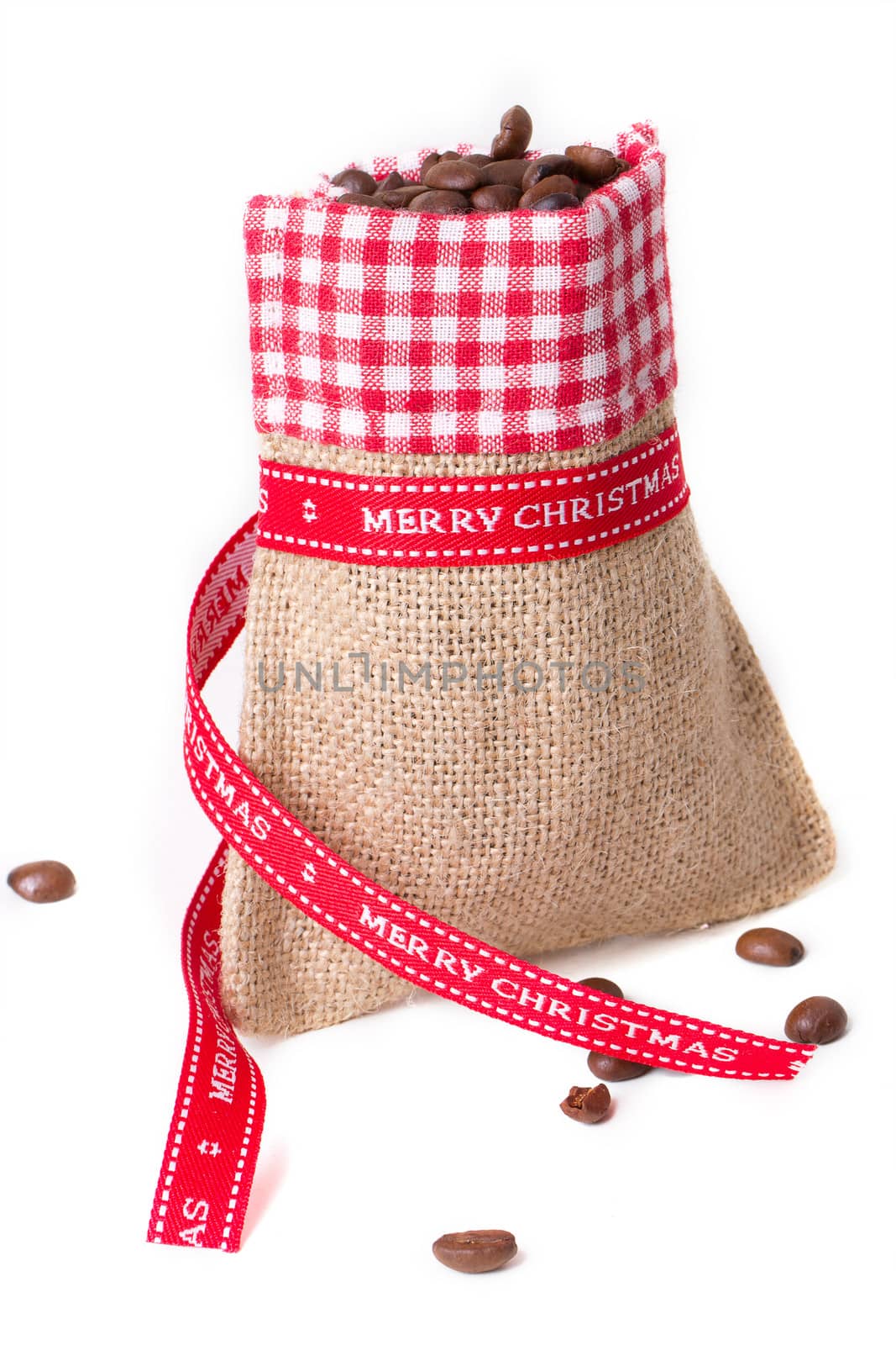 closed sack bag with red bow isolated on white background