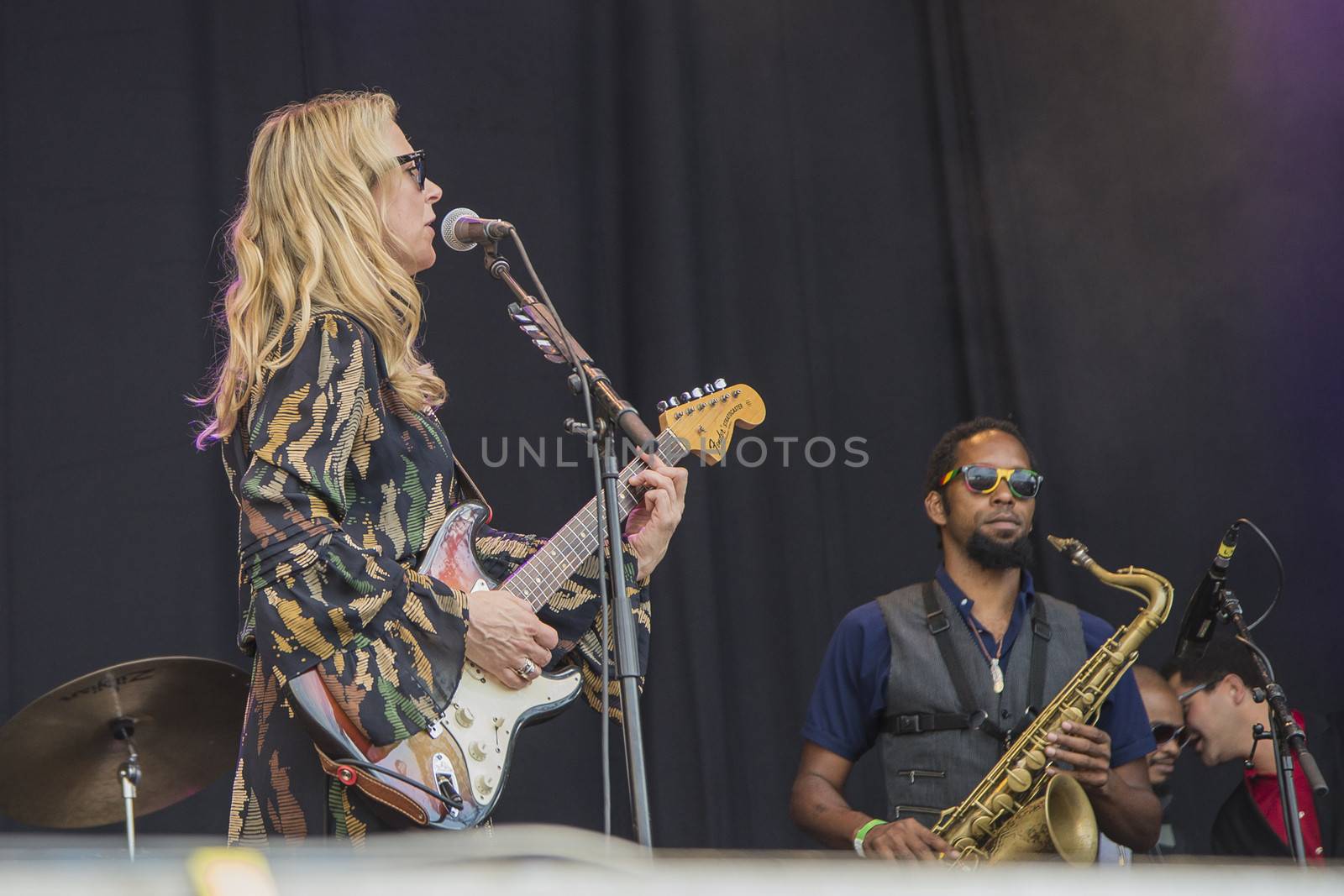 Each year the first week in August held a blues festival in Notodden, Norway. Photo is shot from the concert with Tedeschi Trucks Band. The band members are: Susan Tedeschi ��� lead vocals, rhythm guitar. Derek Trucks ��� lead guitar. Kofi Burbridge ��� keyboards, flute. Tyler Greenwell ��� drums, percussion. J. J. Johnson ��� drums, percussion. Kebbi Williams ��� saxophone. Maurice Brown ��� trumpet. Saunders Sermons ��� trombone. Mike Mattison ��� harmony vocals. Mark Rivers ��� harmony vocals.