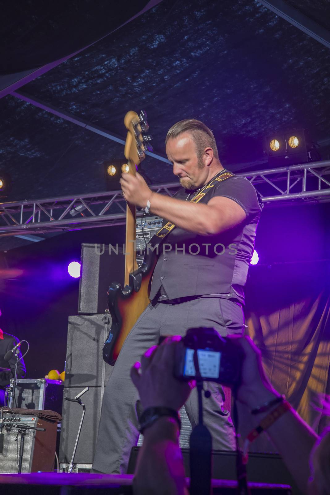 Each year the first week in August held a blues festival in Notodden, Norway. Photo is shot from the concert with a local band called: Little Andrew Band. The band members are: Vocals and guitar Andreas Stamnes (Little Andrew ), bass: Paul M.Dahl��, drums: Robert Skoglund, piano: Daniel T. R��ssing