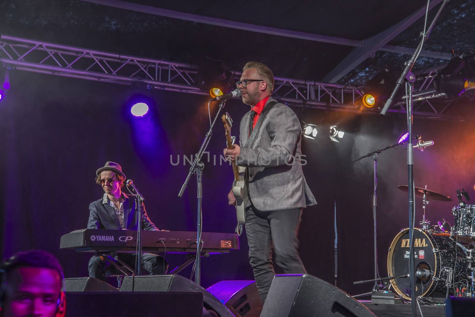 Each year the first week in August held a blues festival in Notodden, Norway. Photo is shot from the concert with a local band called: Little Andrew Band. The band members are: Vocals and guitar Andreas Stamnes (Little Andrew ), bass: Paul M.Dahl��, drums: Robert Skoglund, piano: Daniel T. R��ssing