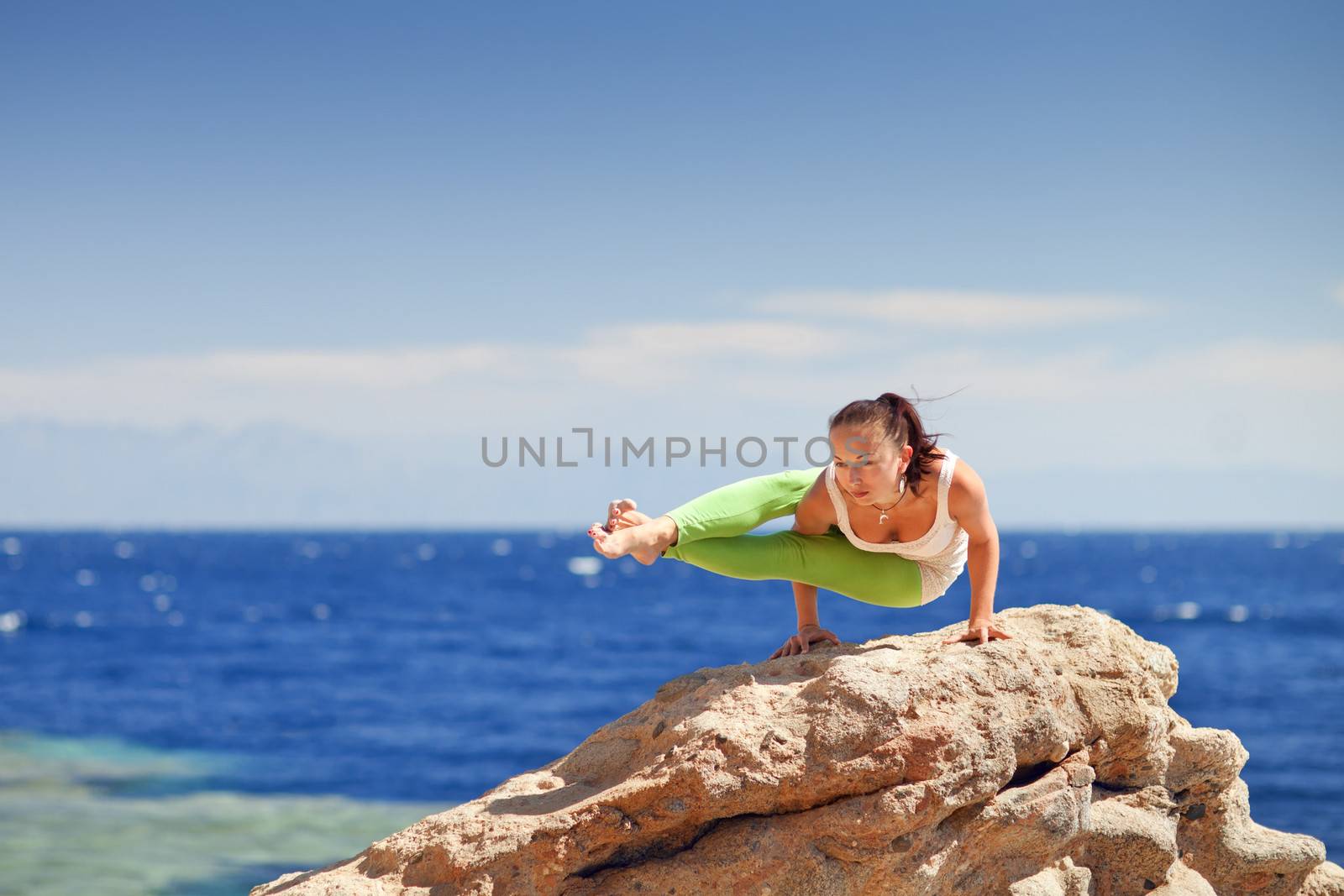 yoga on the mountain by the sea
