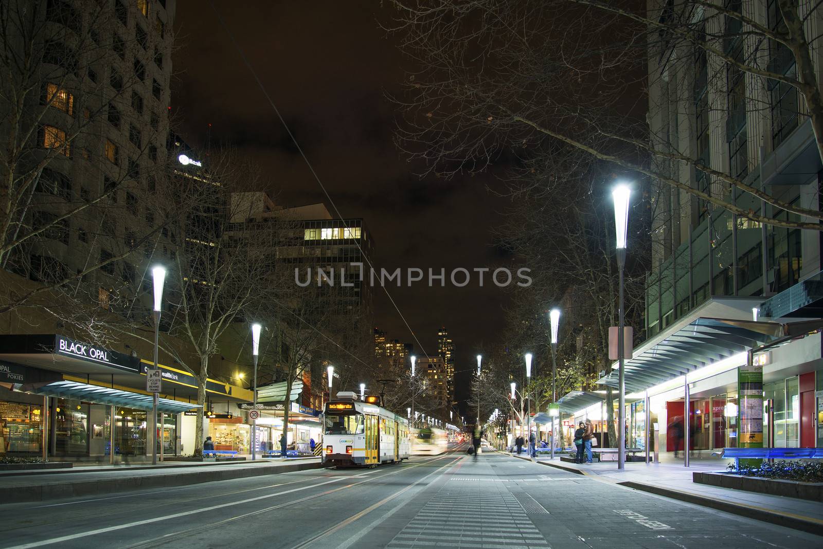 central melbourne street at night in australia by jackmalipan