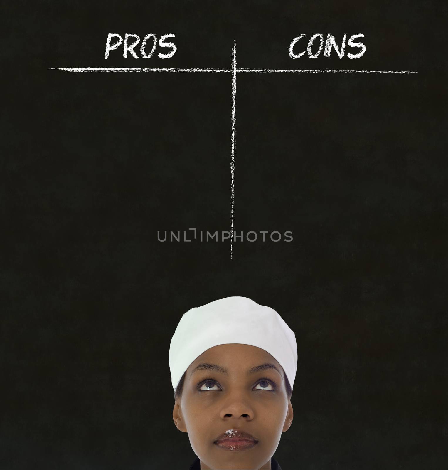 African American woman chef thinking with chalk pros and cons on blackboard background by alistaircotton