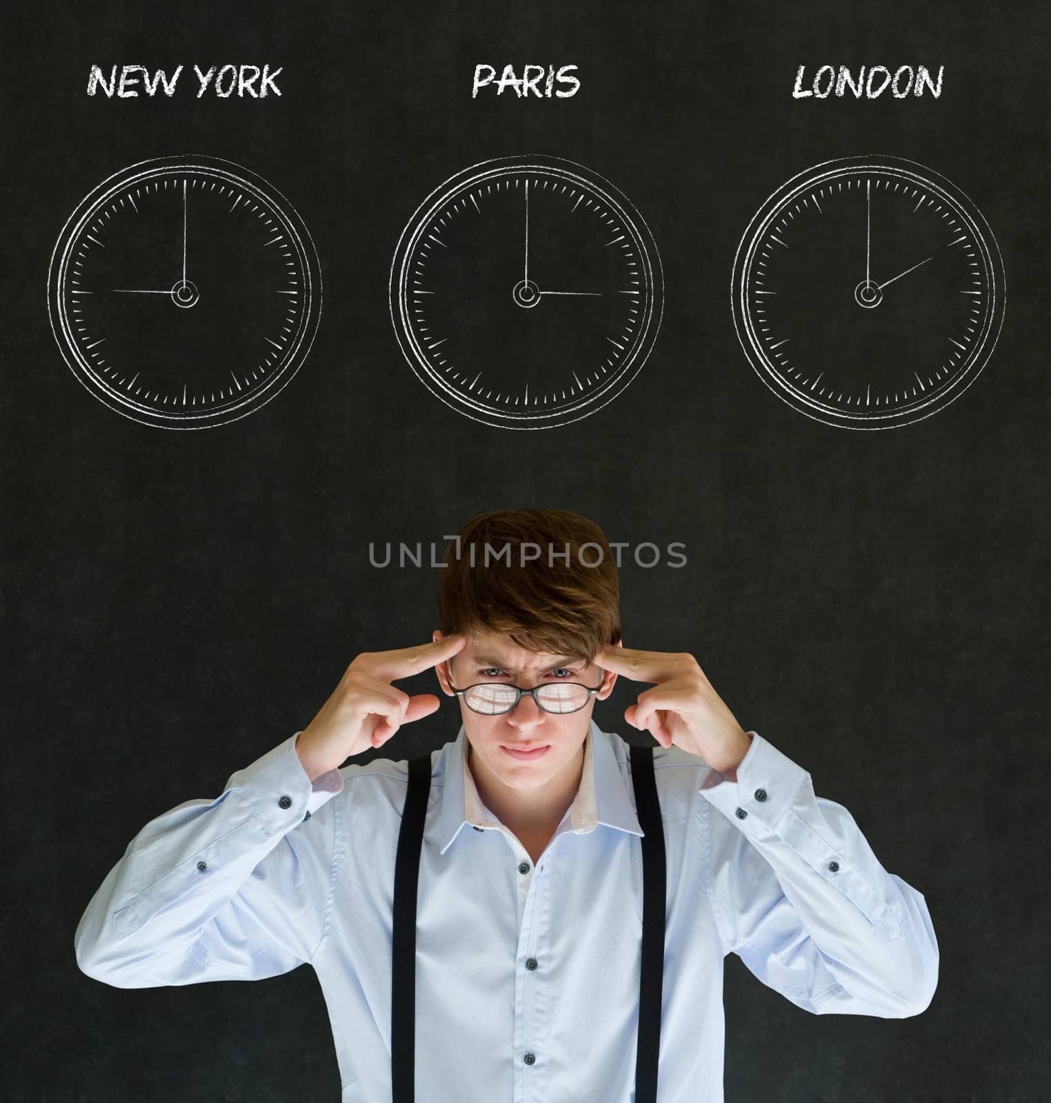 Businessman thinking with New York, Paris and London chalk time zone clocks on blackboard background