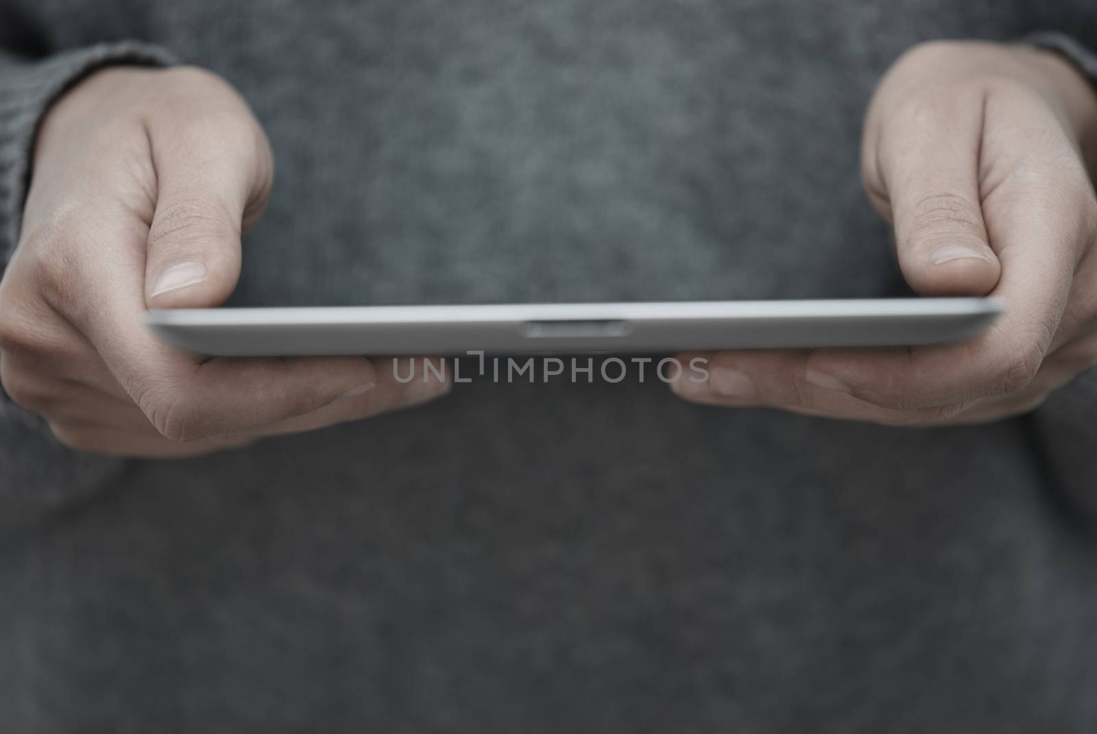 Human hands with tablet PC. Close-up view