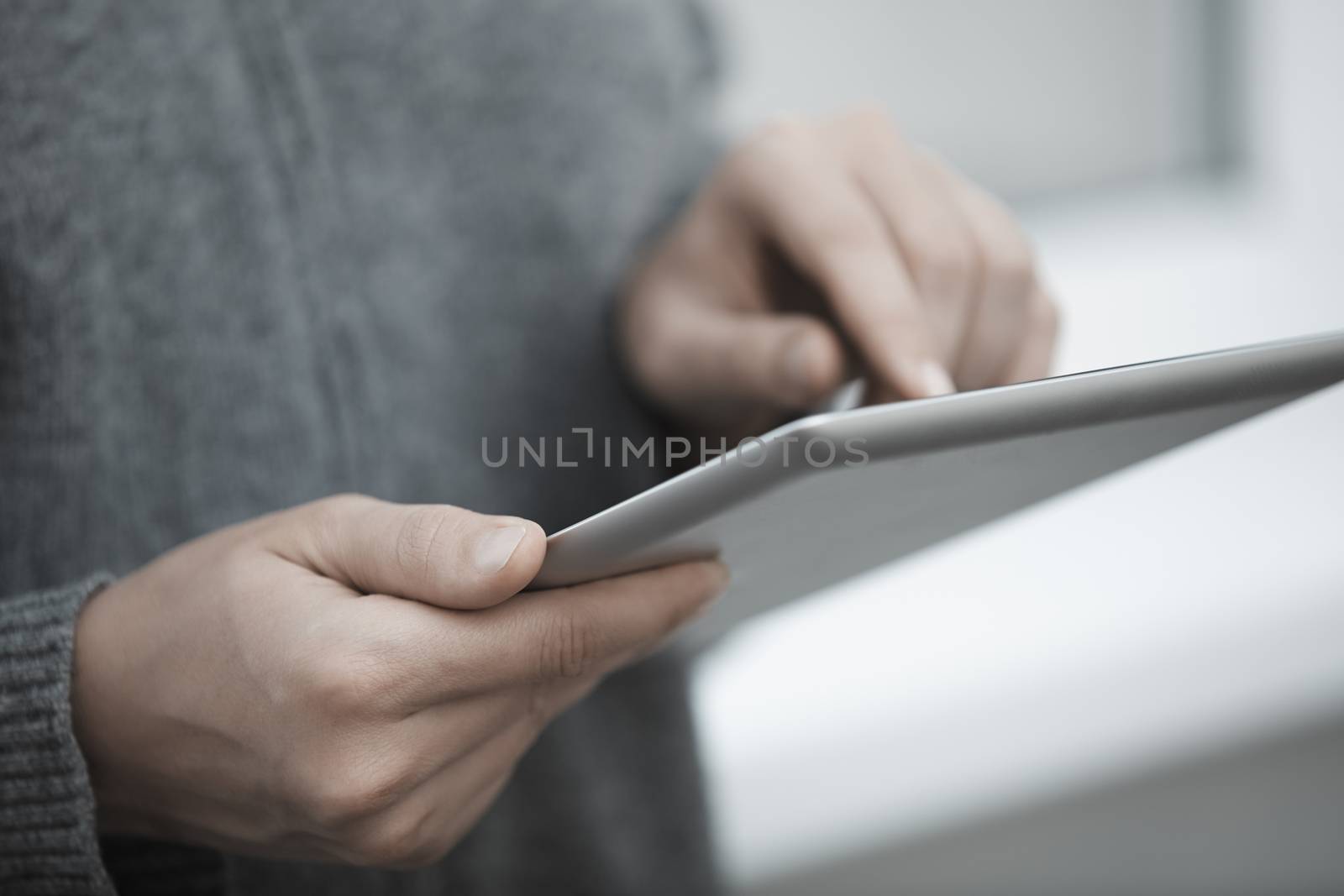 Human hands with tablet PC. Close-up view