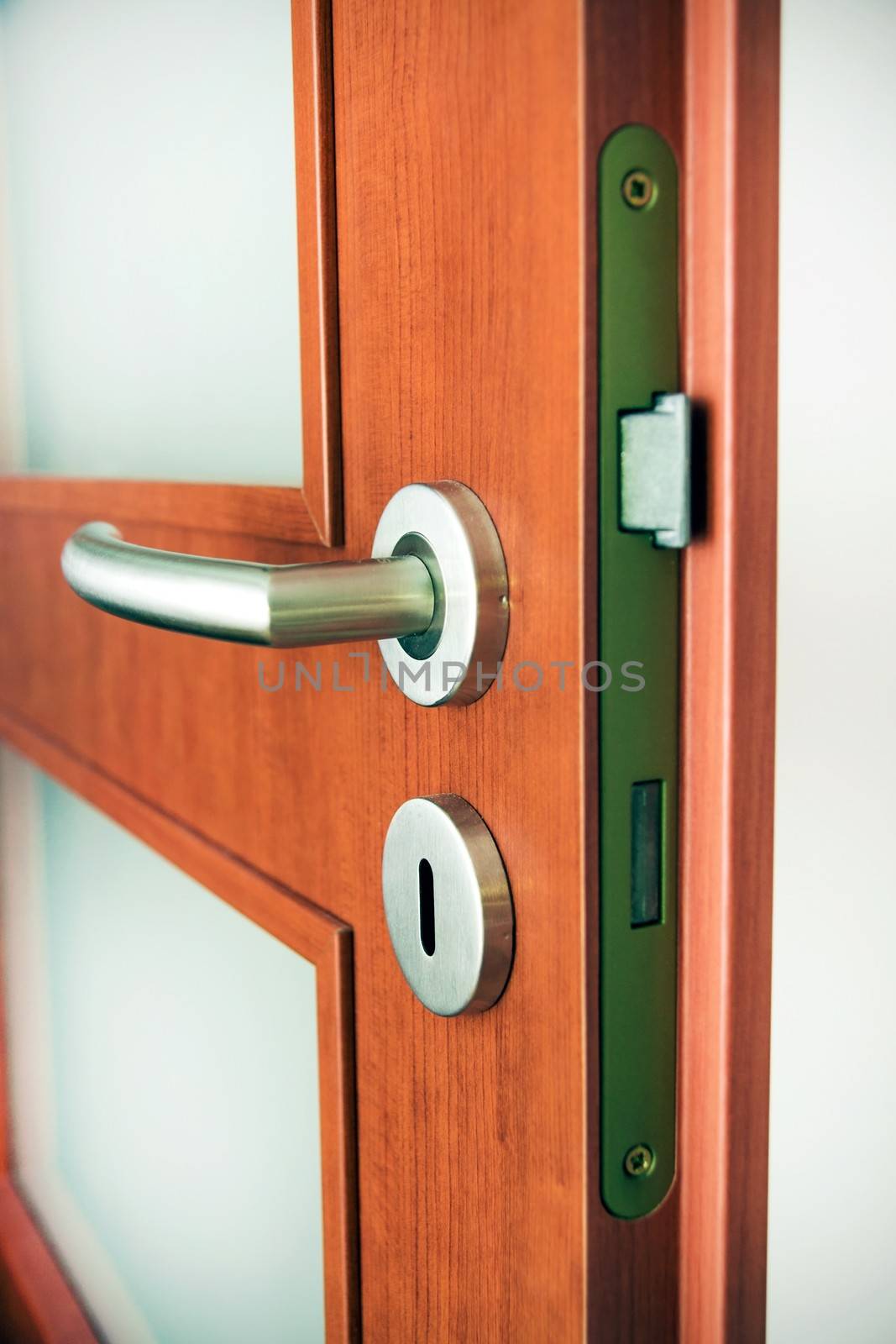 Steel lock on wooden door