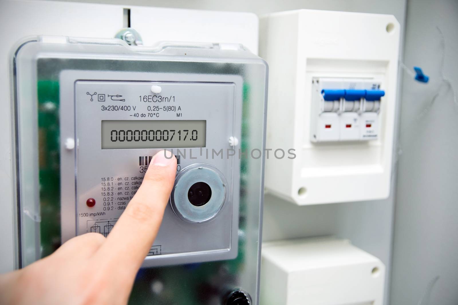 Modern electric meter close up view by simpson33