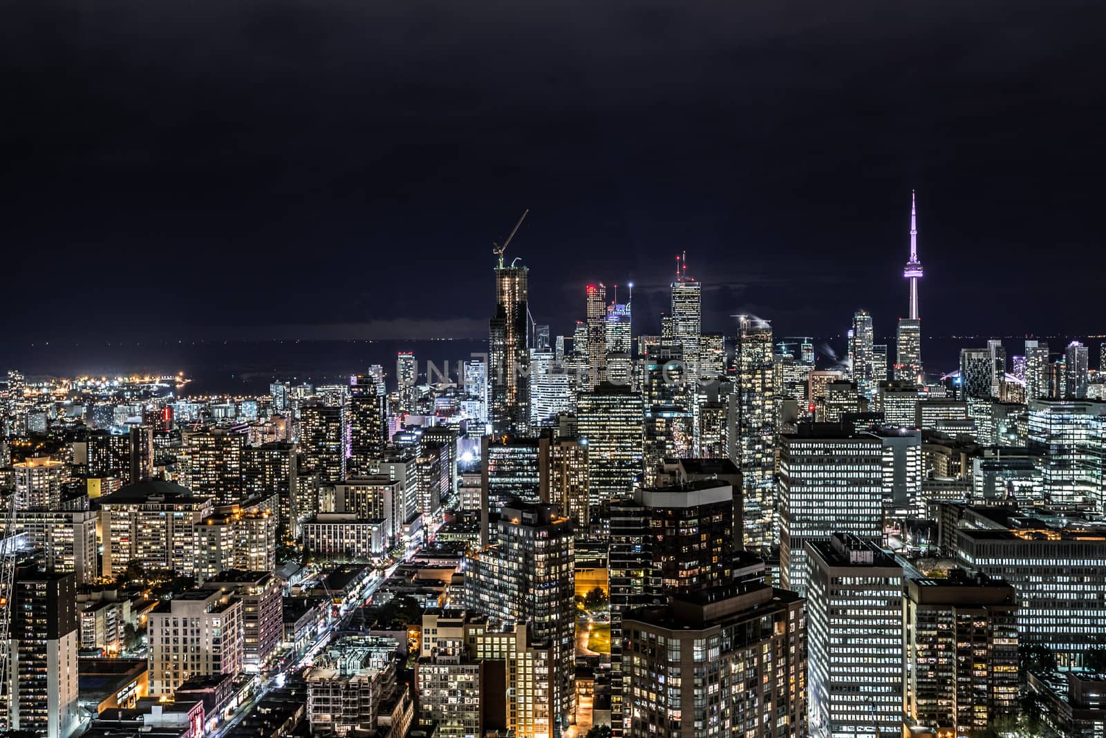 Full view of downtown Toronto at night with glamour lights