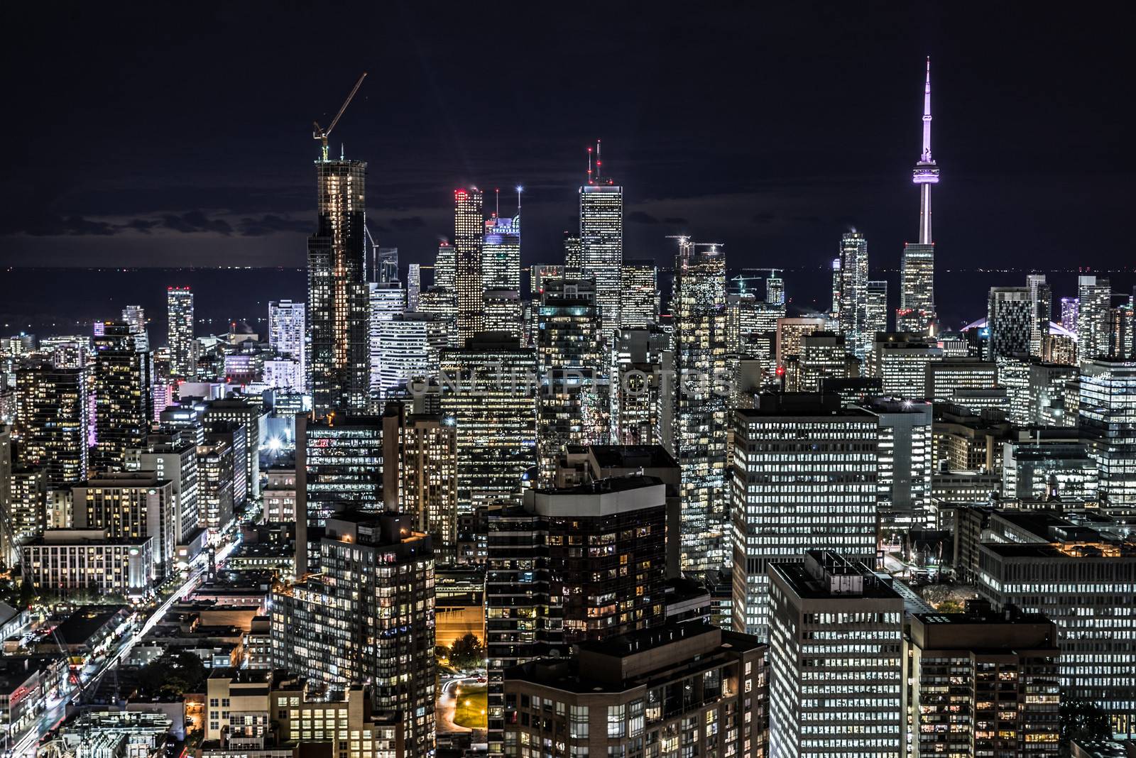 Full view of downtown Toronto at night with glamour lights