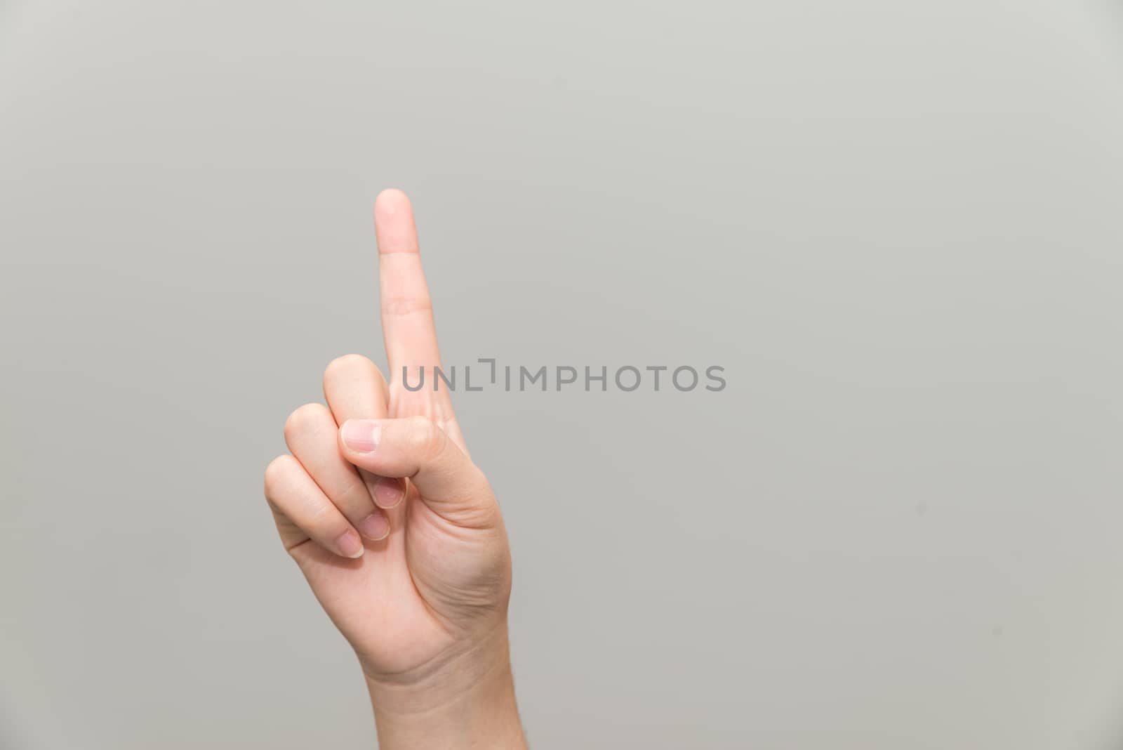 Hand with one finger up by IVYPHOTOS