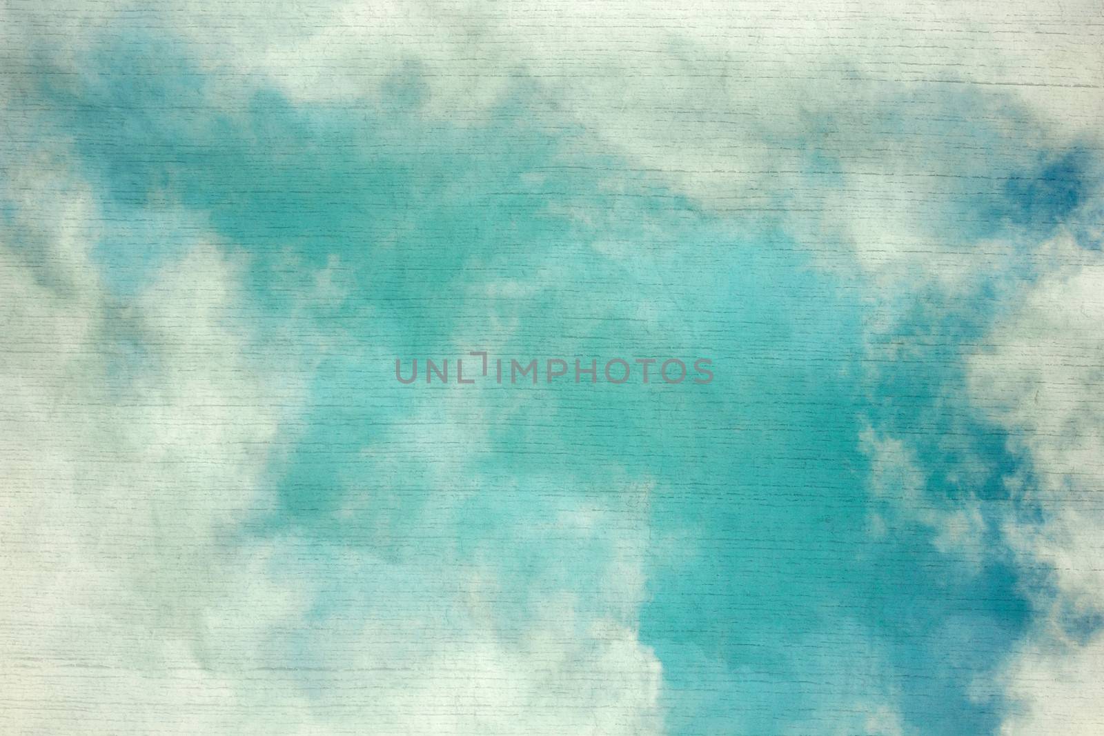 Vintage background in the blue shade with clouds 