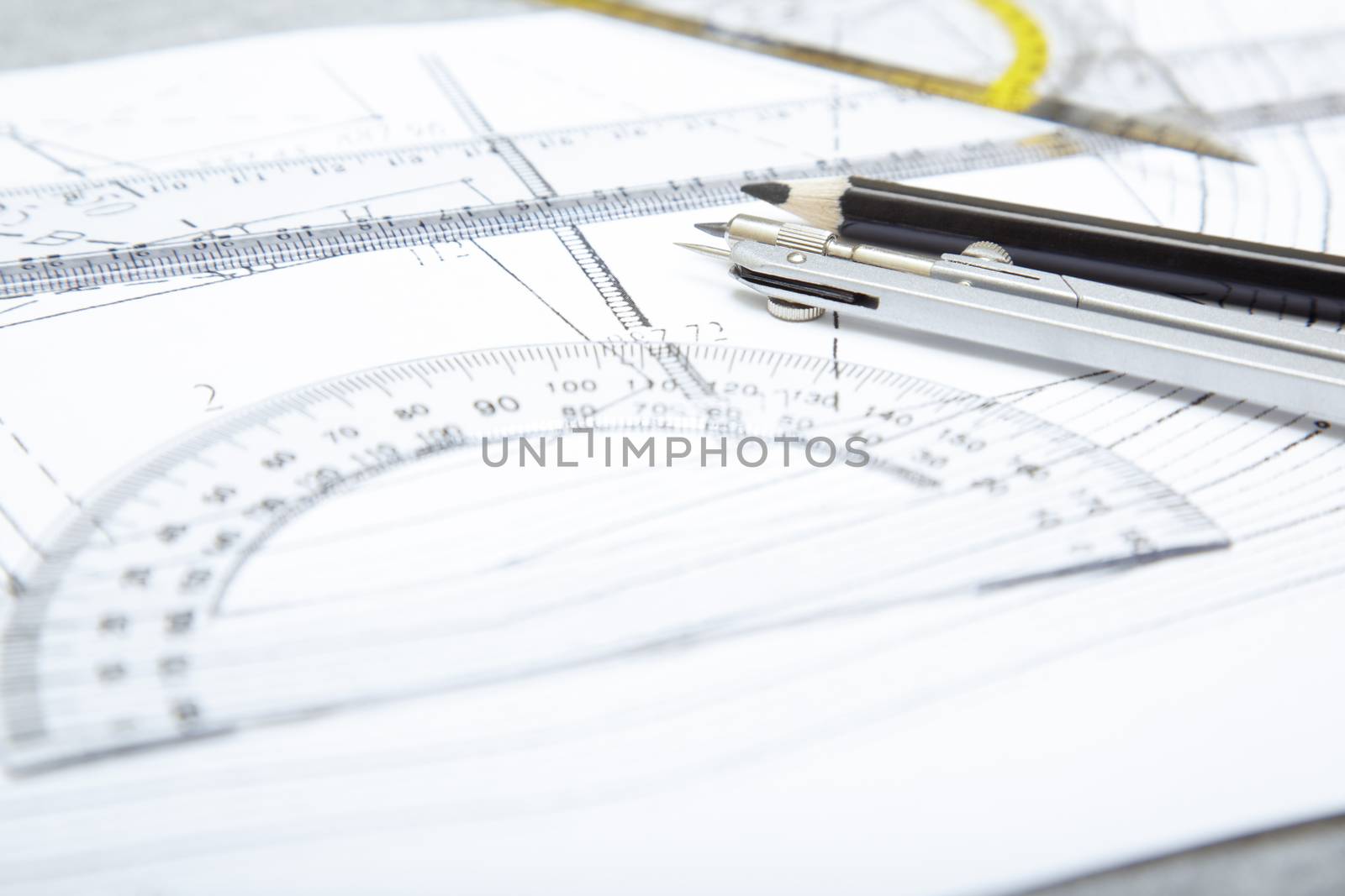 Scheme with compasses rulers and pencil. Close-up photo