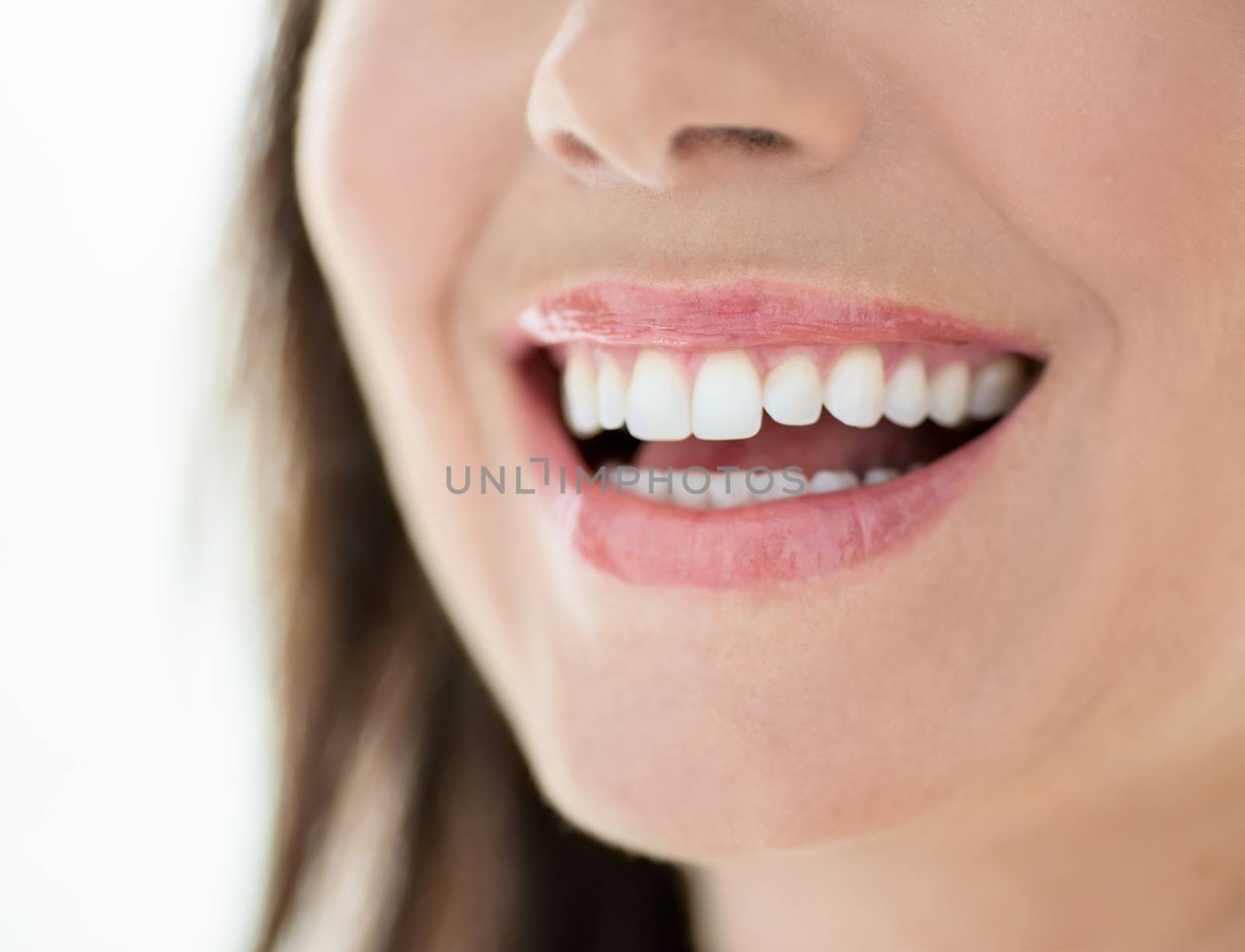 Horizontal confident smile close up of a mature woman