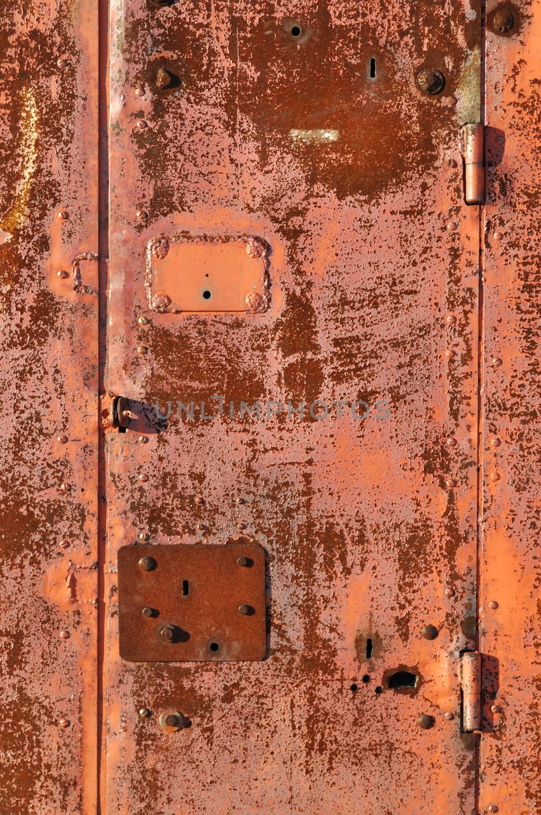 Close up of red rusty steel gate surface