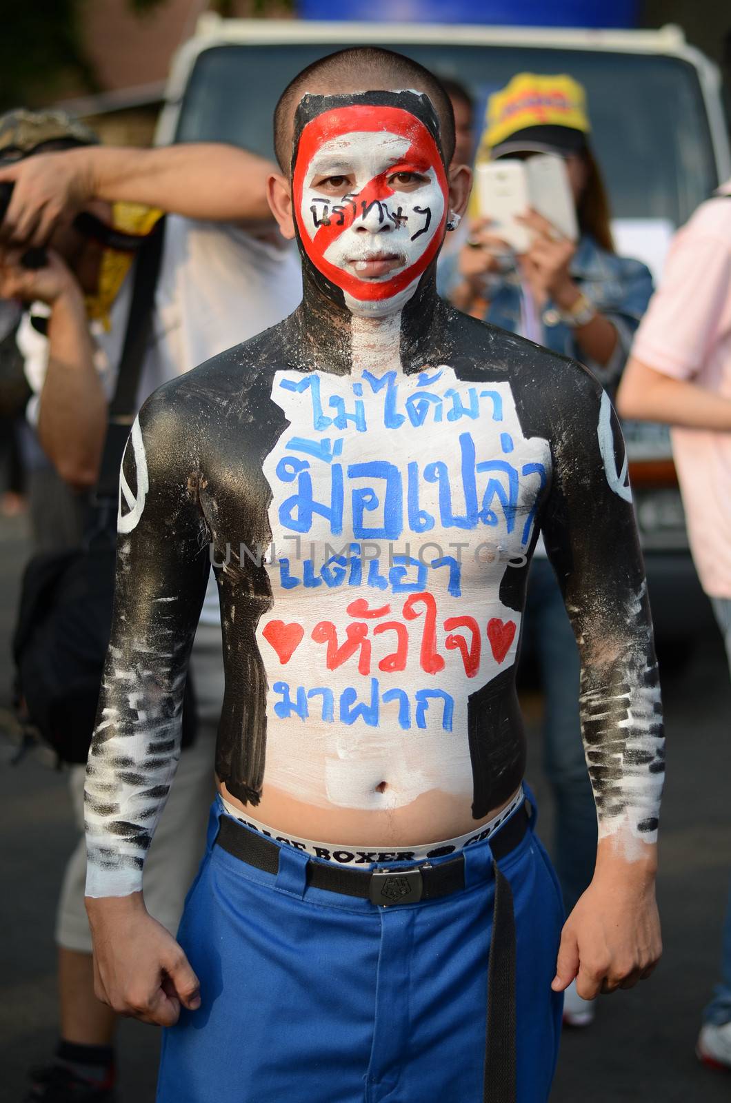 BANGKOK - NOVEMBER 11, 2013 : Anti-government protesters at the Democracy Monument on November 11, 2013 in Bangkok, Thailand. The protest Against The Amnesty bill in Bangkok, capital of Thailand 