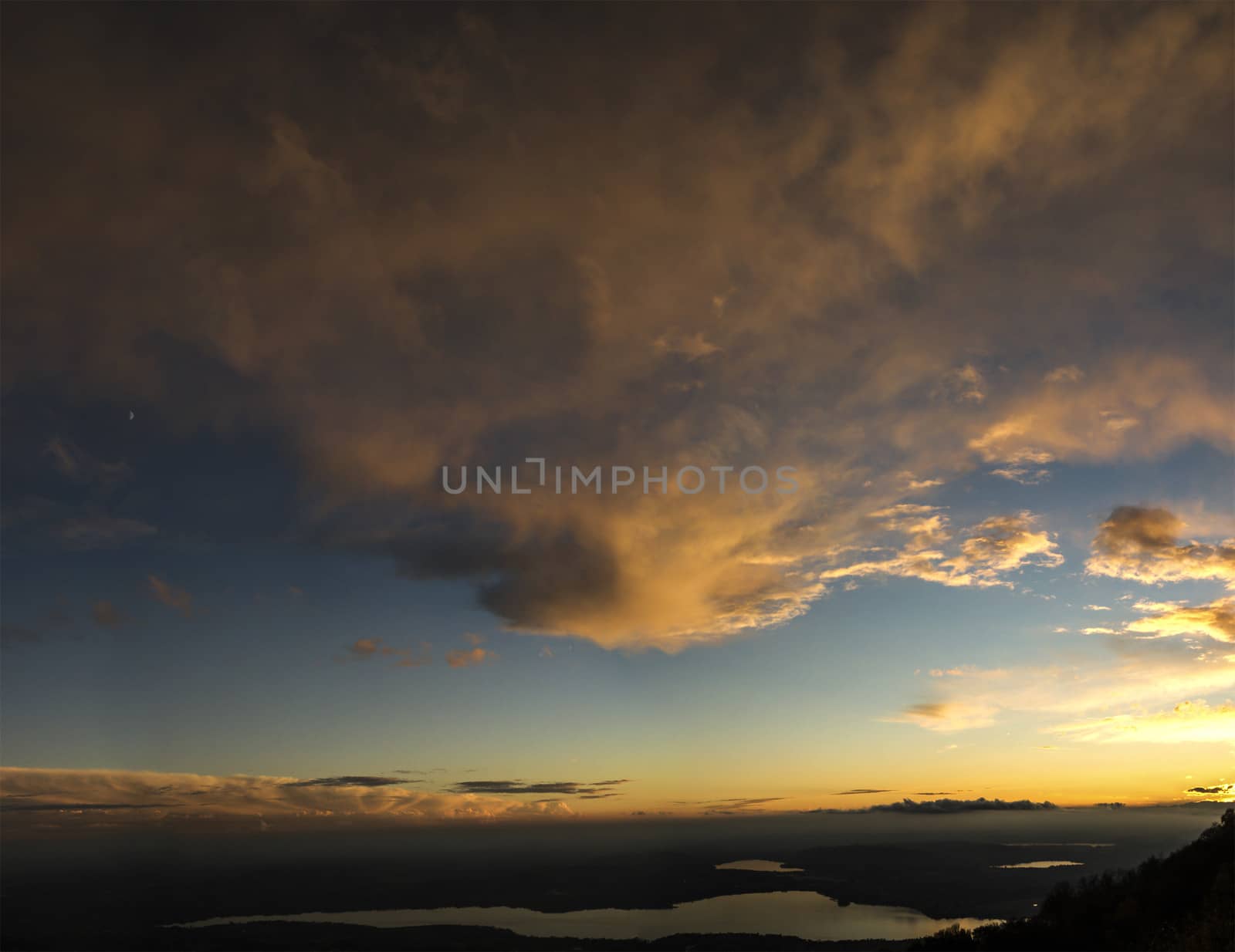 Sunset over the Varese lake in autumn season, Lombardy - Italy